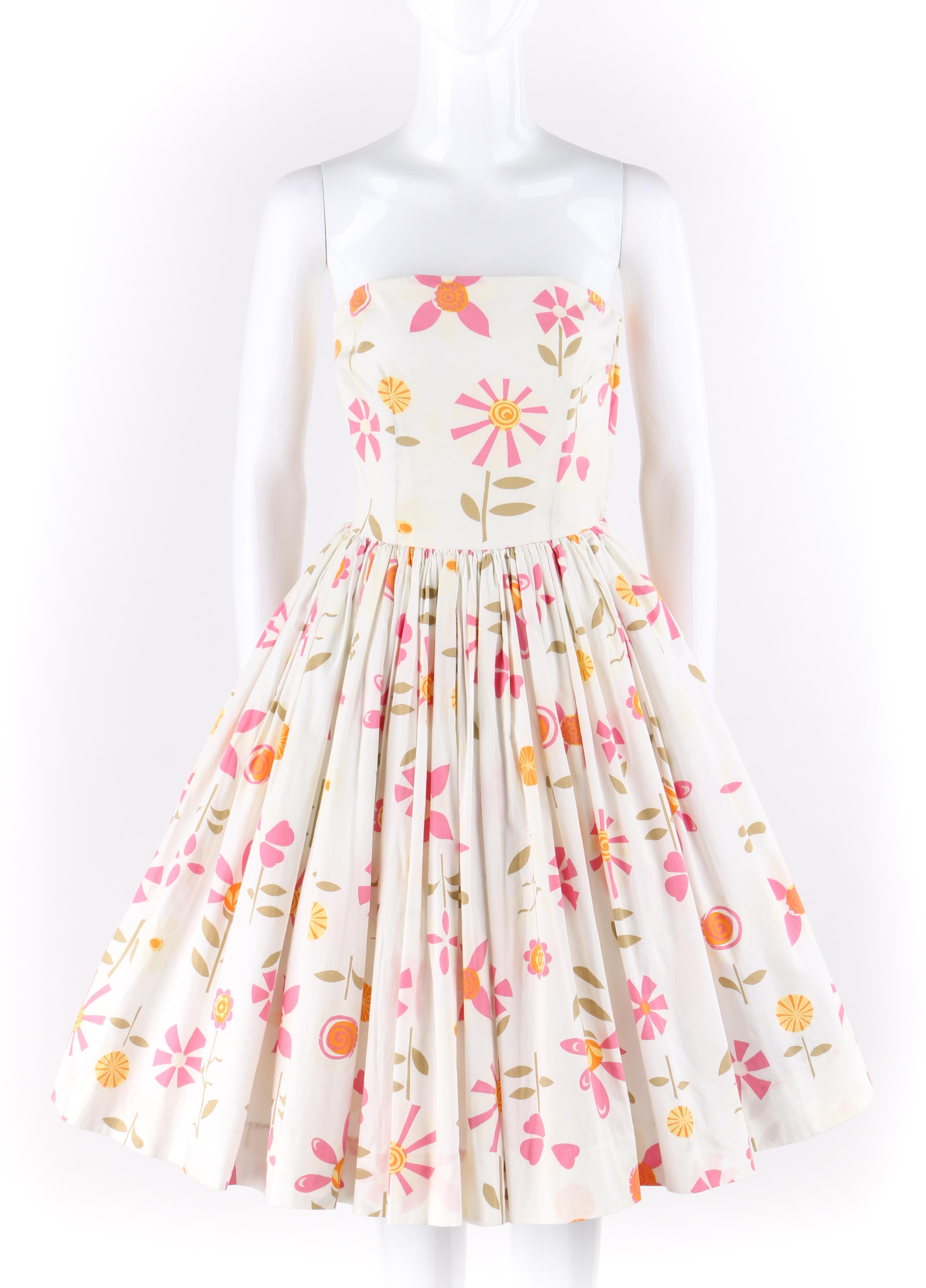 COUTURE c.1950's Fit & Flare Circle Skirt Floral Strapless Day Party Dress 
 
Brand / Manufacturer: no label couture made one of a kind
Circa: 1950's
Style: Strapless dress
Color(s): Shades of white, yellow, orange, green, and pink
Lined: