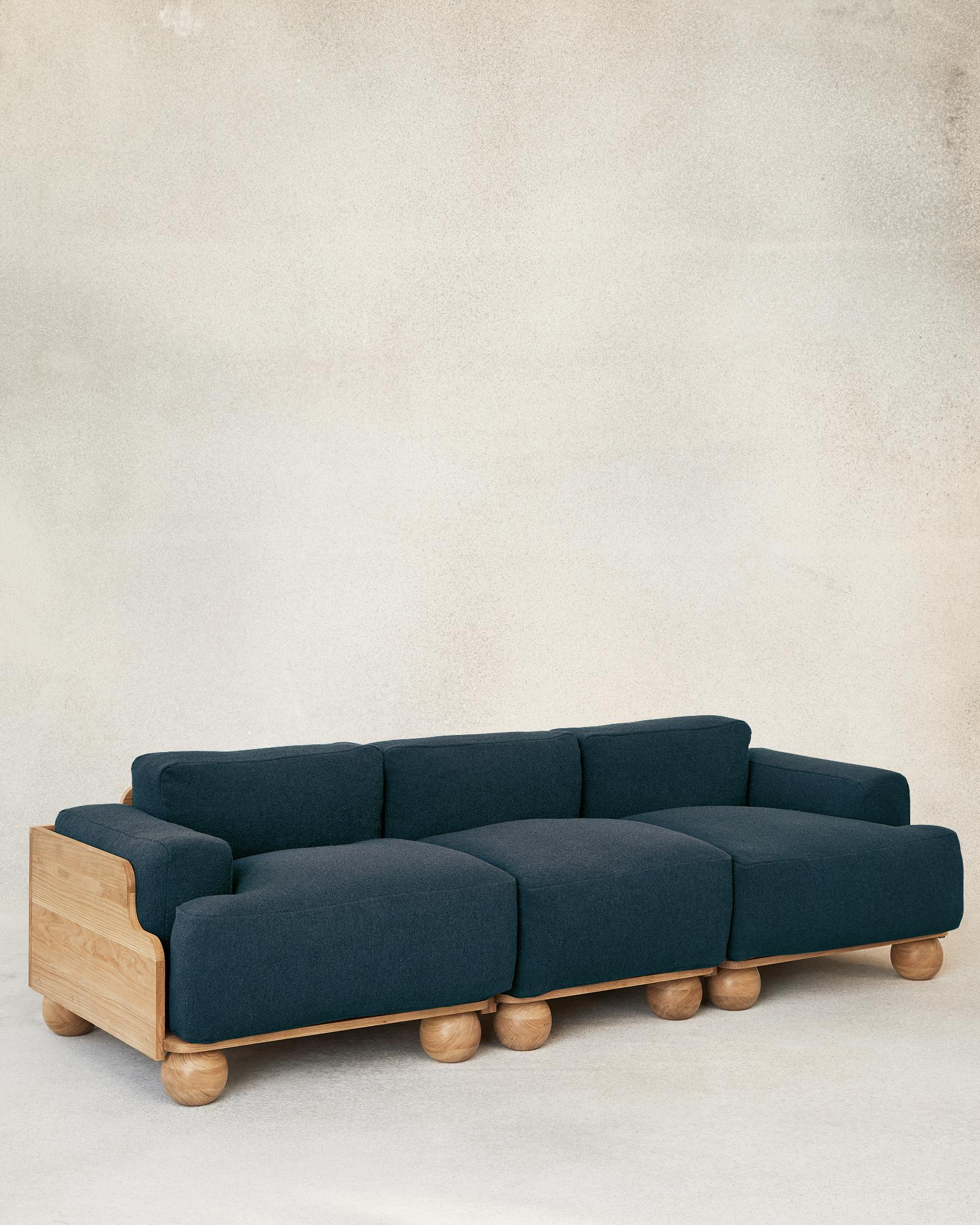 The Cove Sofa’s adapts to any interior environment and beckons to be sat in all day. The modular design allows versatile combinations and lengths of two-, three- or more seaters with or without arms. 

Expanses of sculptural solid oak encase the