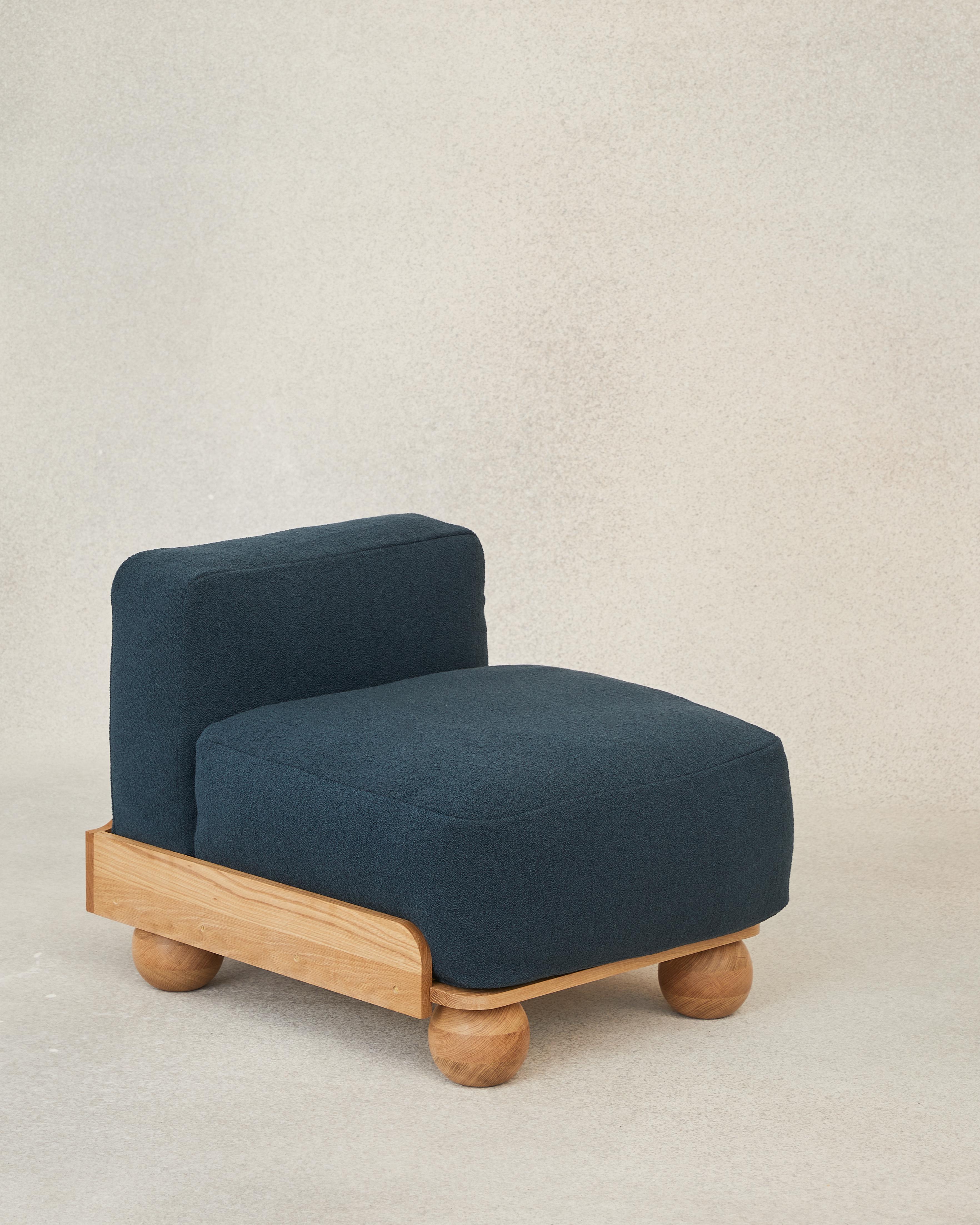 The Cove Slipper is a pared back armless seat designed to stand alone or join its modular family: combined into a sofa of any length or paired with the Cove Footstool to make a chaise lounge.

Like its Cove siblings, the Sipper reveals all its