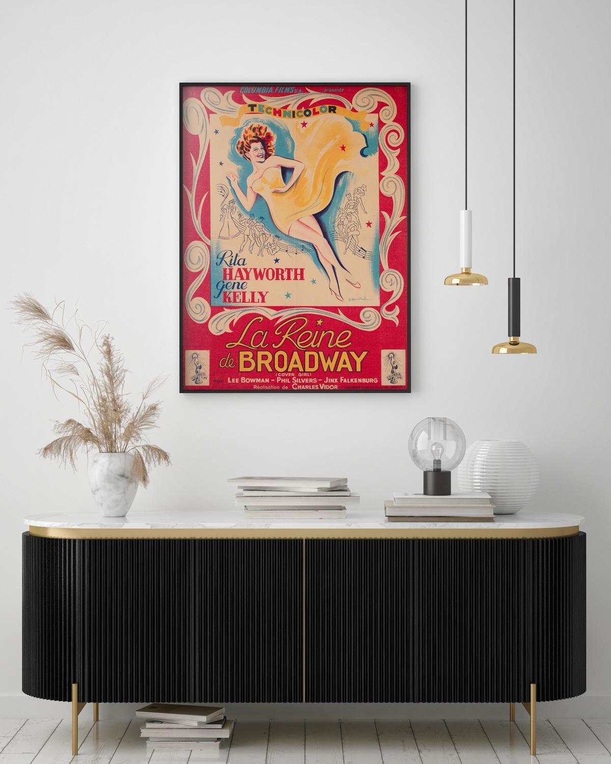 Cover Girl Película estadounidense de 1944, comedia romántica musical, dirigida por Charles Vidor y protagonizada por Rita Hayworth y Gene Kelly. Precioso material gráfico para la reedición francesa de los años 50.

Este póster original de película