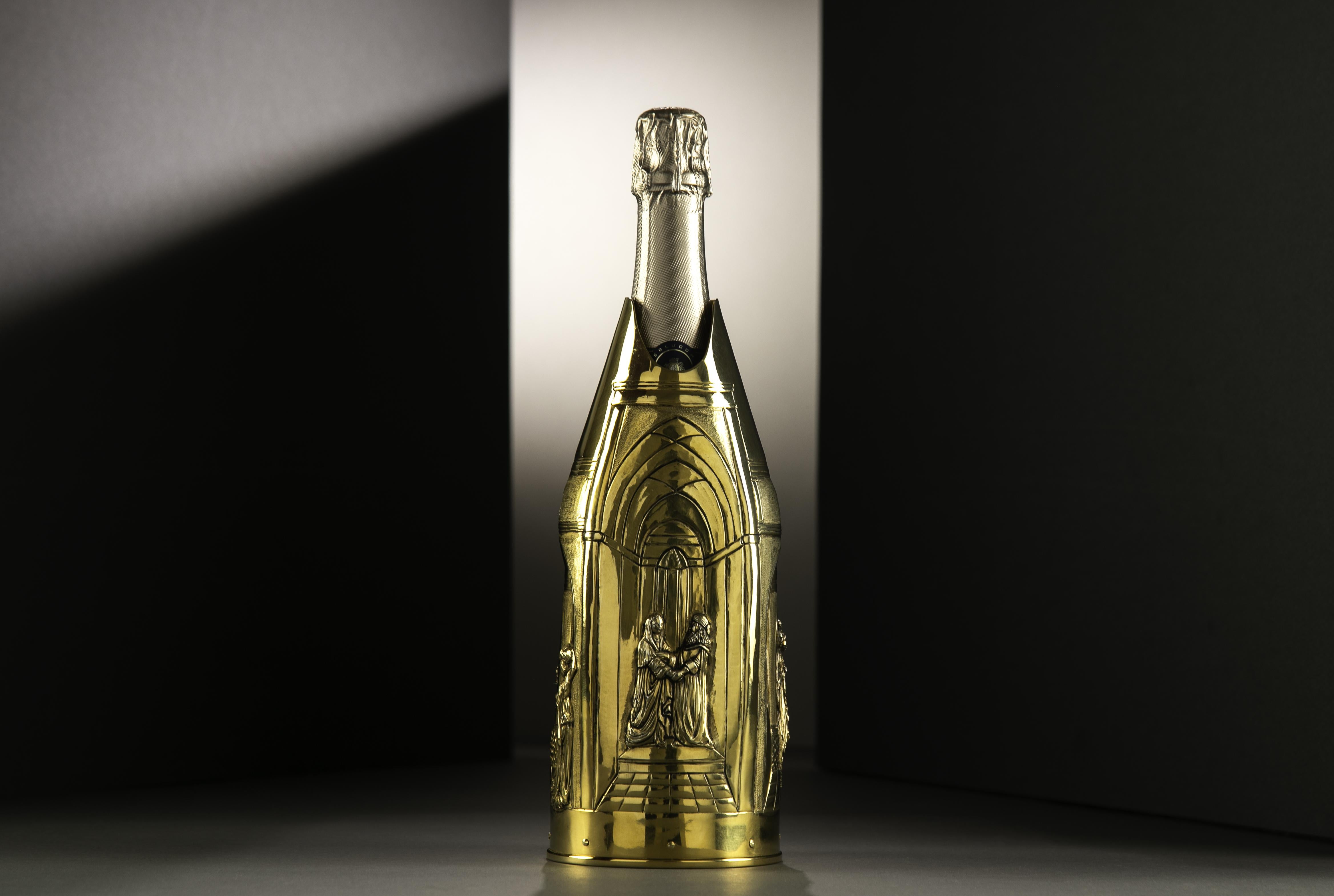 Introducing a unique champagne K-OVER from our Work of Art collection. Hand-chiseled, engraved, and gold-plated by Lorenzo Foglia, our celebrated artist. This is a special one of a kind piece.

Inspired by the renowned Gates of Paradise, Ghiberti’s