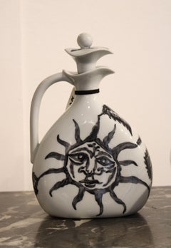 Covered pot in enamelled porcelain with a sun, France, circa 1960