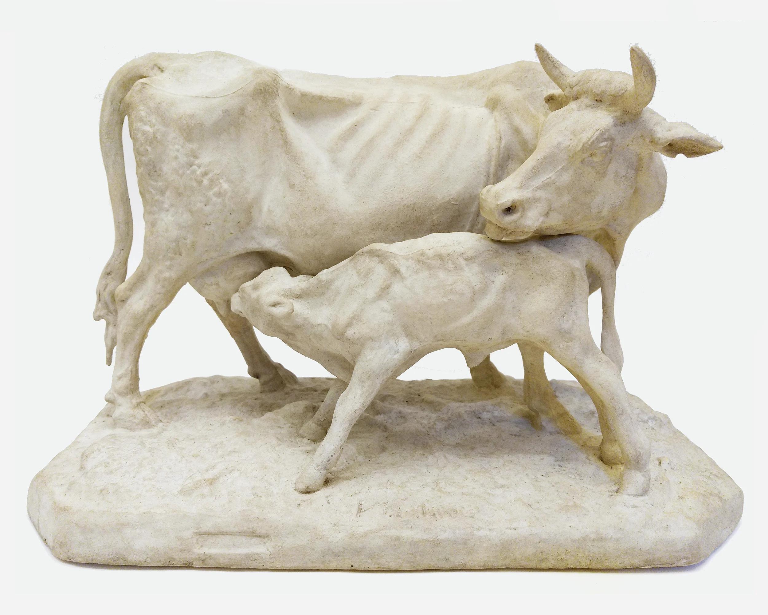 Scultura che rappresenta una mucca e il suo vitello, firmata Pierre Jules Mêne.
Cartuccia 