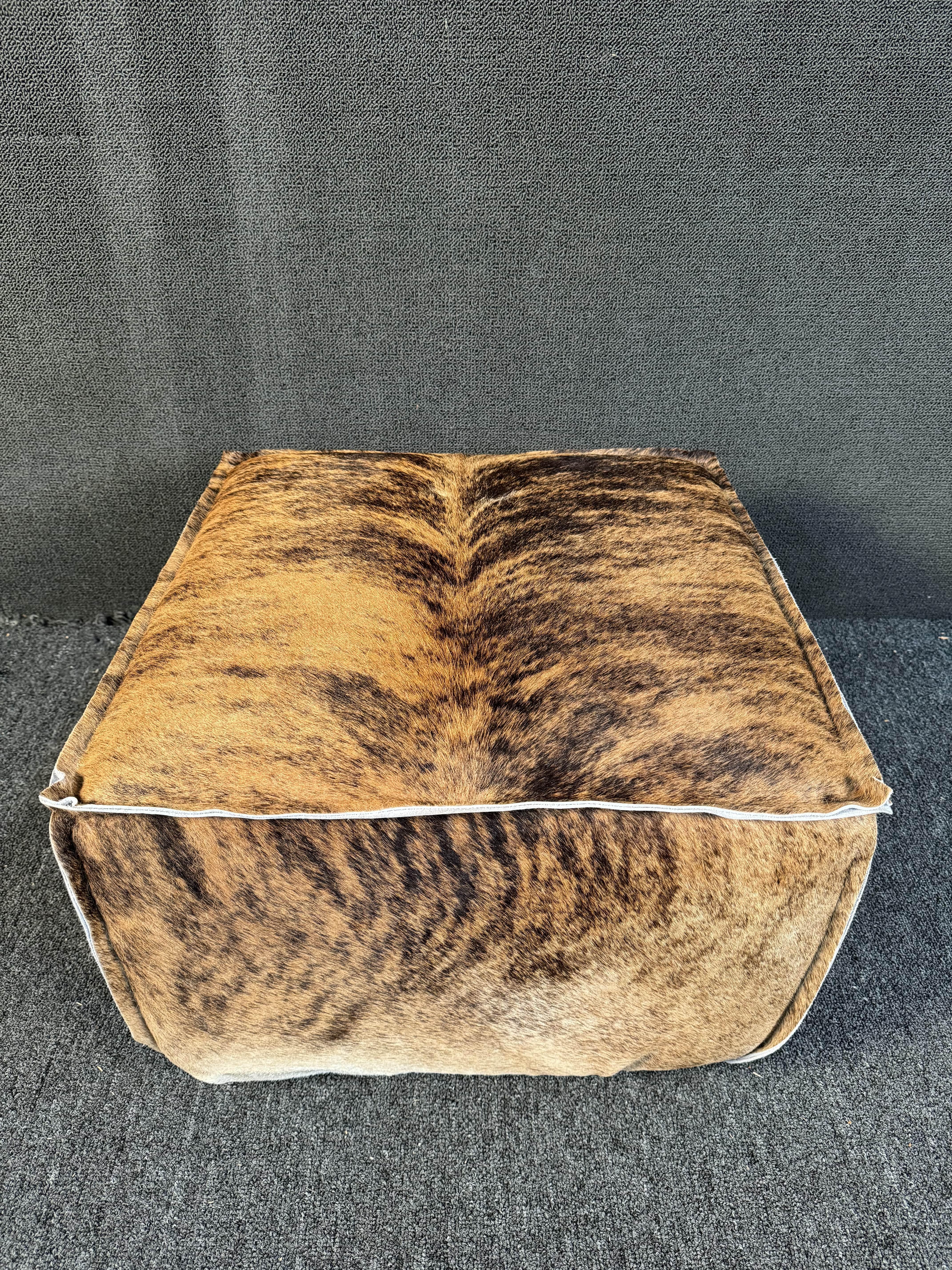 Mid-Century Modern Cowhide Upholstered Ottoman For Sale