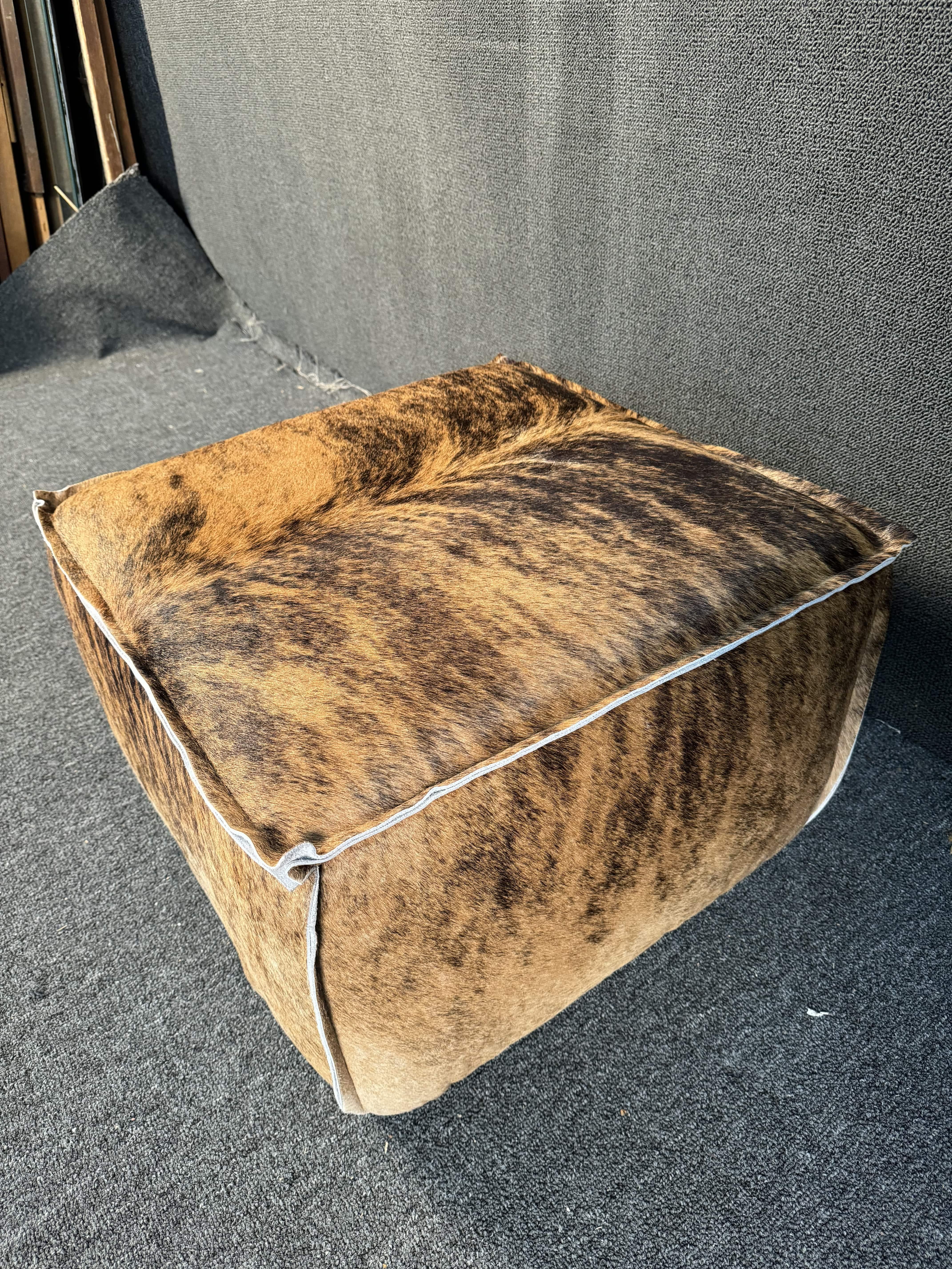 Unknown Cowhide Upholstered Ottoman For Sale