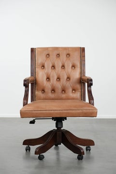 Cow leather and wood Chesterfield office chair in English style on wheels