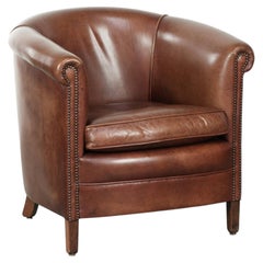 Sillón club de cuero de vaca en bonito color coñac oscuro de estilo inglés
