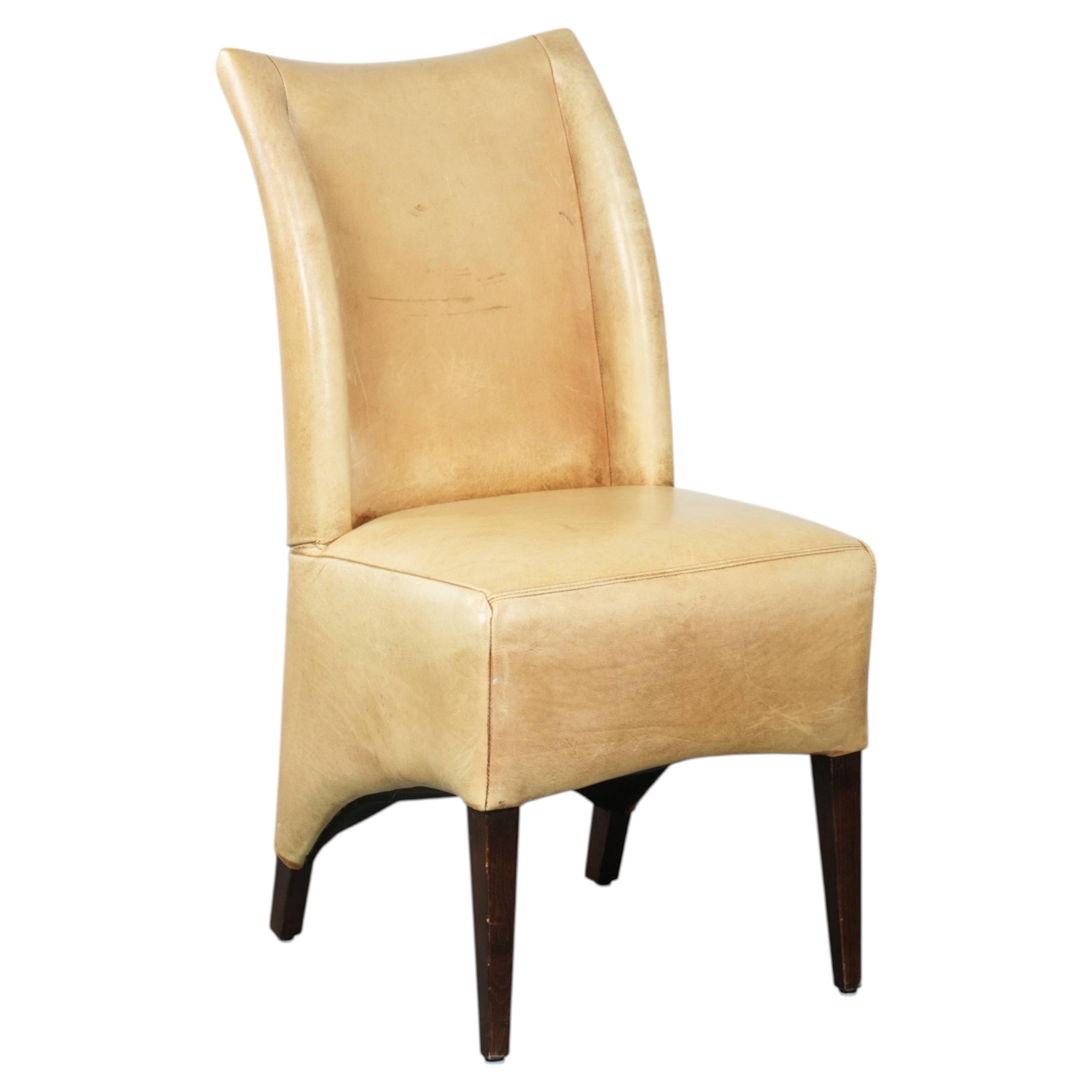 Cow leather dining/side/desk chair with comfortable seat and a high back For Sale