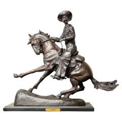 Cowboy, Cast Bronze Sculpture on Marble Base, after Frederic Remington