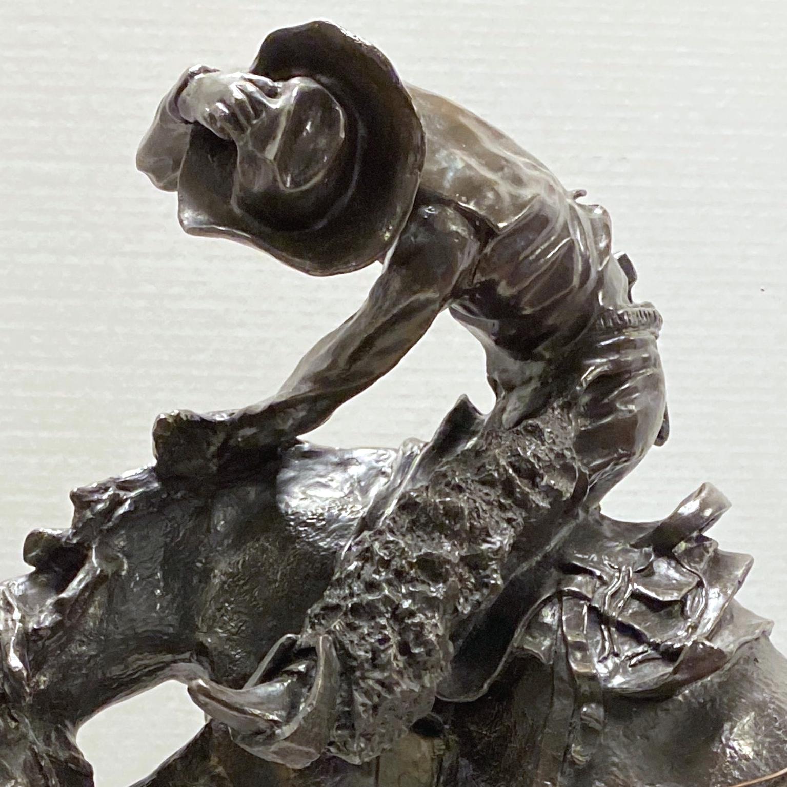 remington cowboy statue