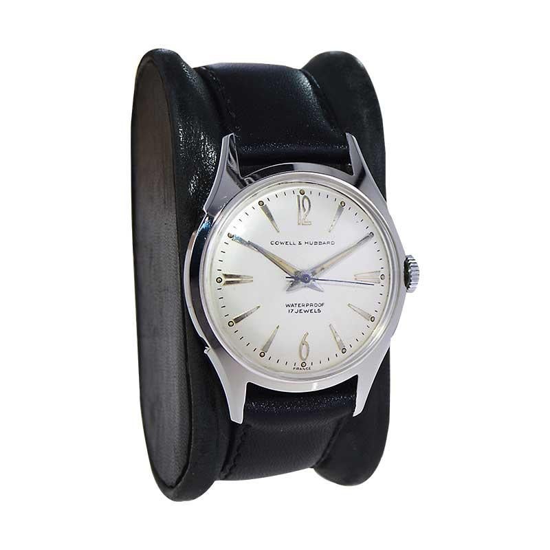 FACTORY / HOUSE: Cowell & Hubbard / Swiss Made
STYLE / REFERENCE: Round / Dress Style 
METAL / MATERIAL: Stainless Steel 
CIRCA / YEAR: 1960's
DIMENSIONS / SIZE: Length 32mm X Diameter 41mm
MOVEMENT / CALIBER: Manual Winding / 17 Jewels / Caliber