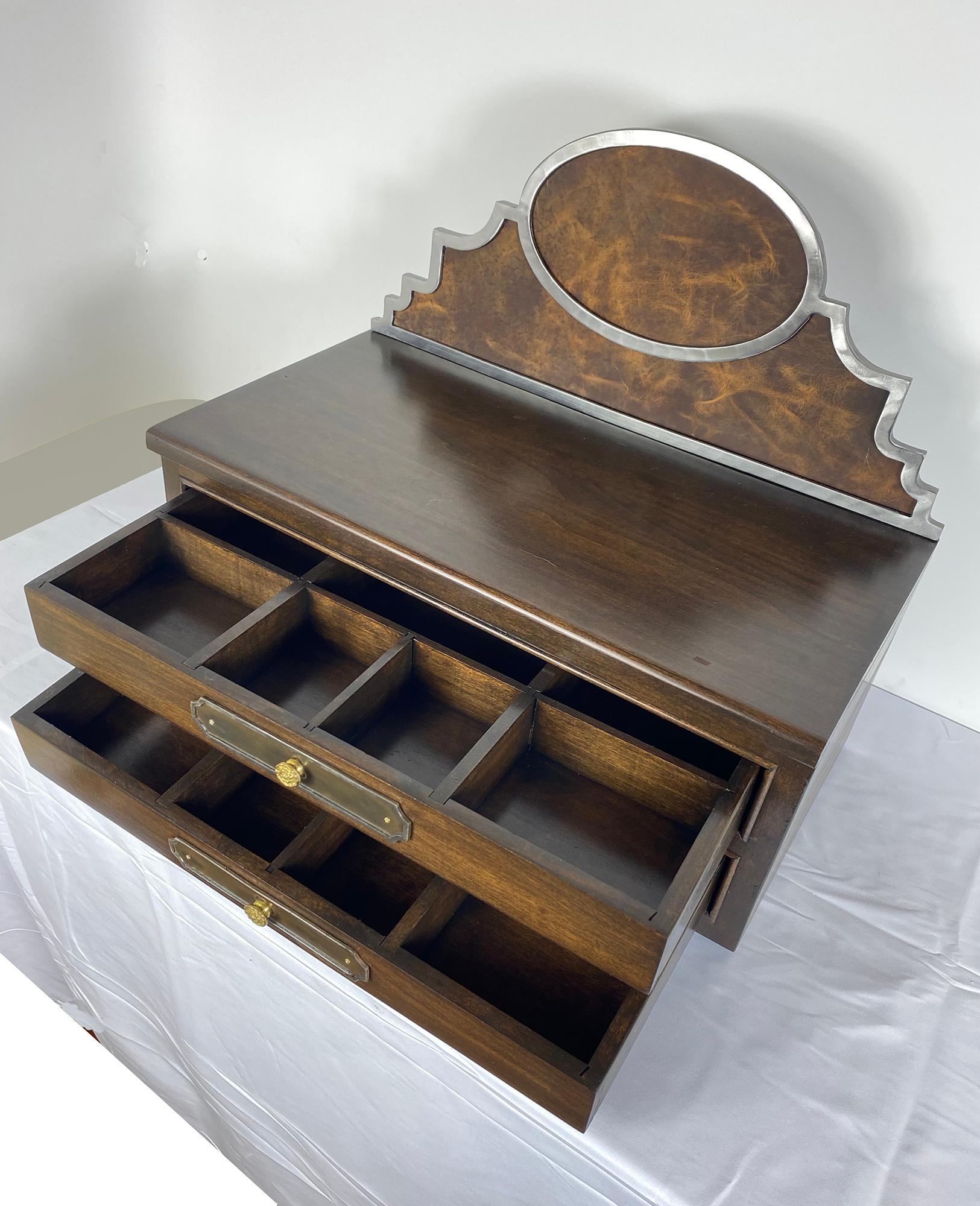 Polished steel trim surrounds  tumbled leather and solid wood to create an elegant rustic look.  A one of a kind gift that is sure to get that special someones attention.  More than just a jewelry box, but a legacy item that will be welcomed by