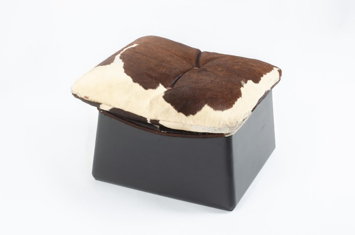 Cowhide armchair and footrest, 1970s For Sale 8
