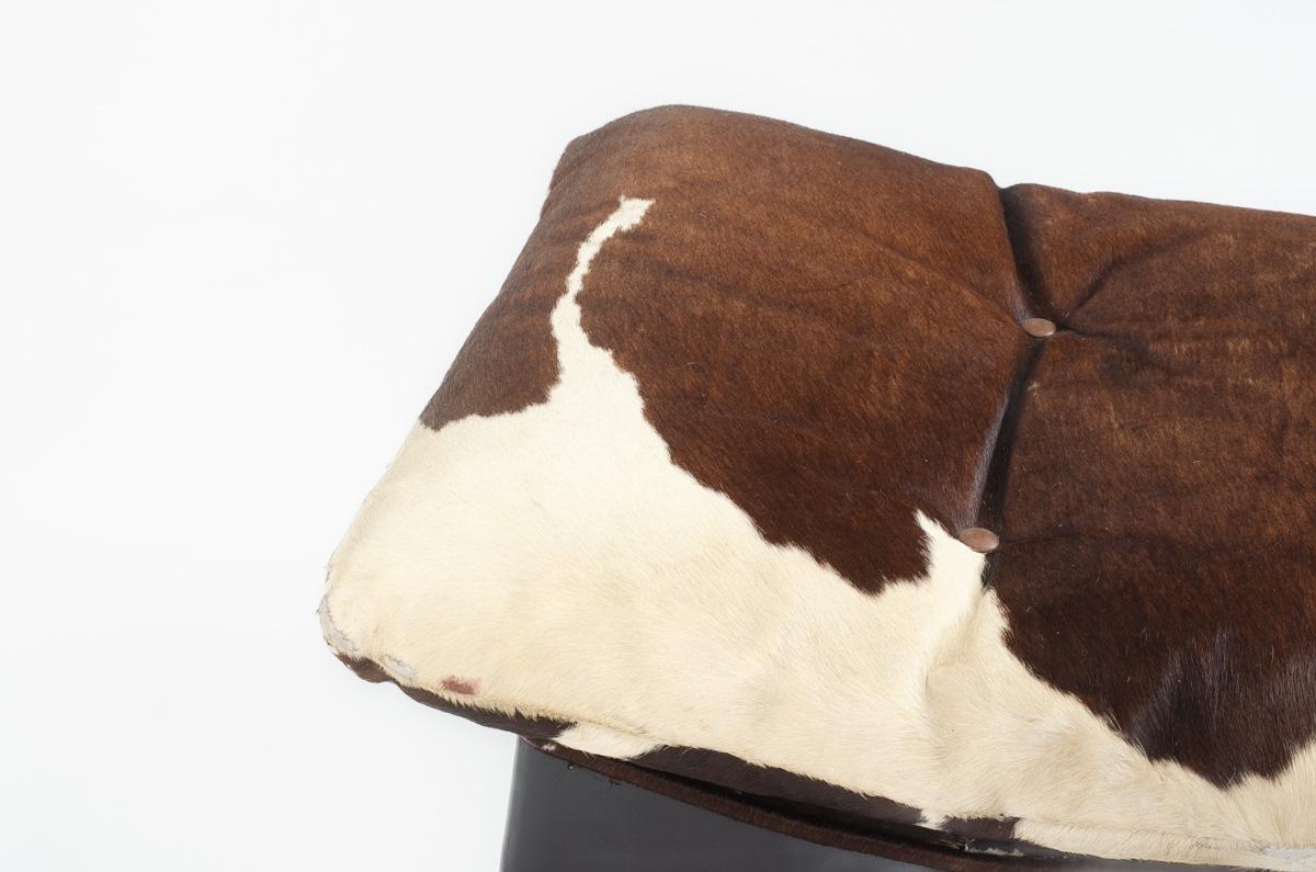 Cowhide armchair and footrest, 1970s For Sale 9