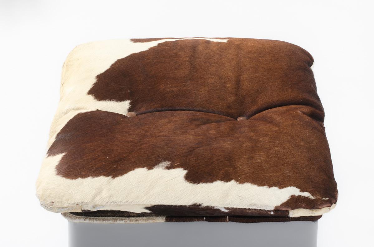 Cowhide armchair and footrest, 1970s For Sale 10