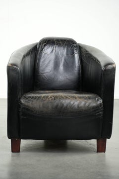 Cowhide aviator armchair in sturdy black vintage cowhide with a rich patina