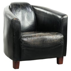 Cowhide aviator armchair in sturdy black vintage cowhide with a rich patina