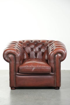Cowhide Chesterfield armchair in a classic English style