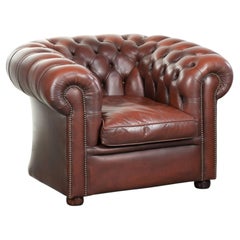 Cowhide Chesterfield armchair in a classic English style