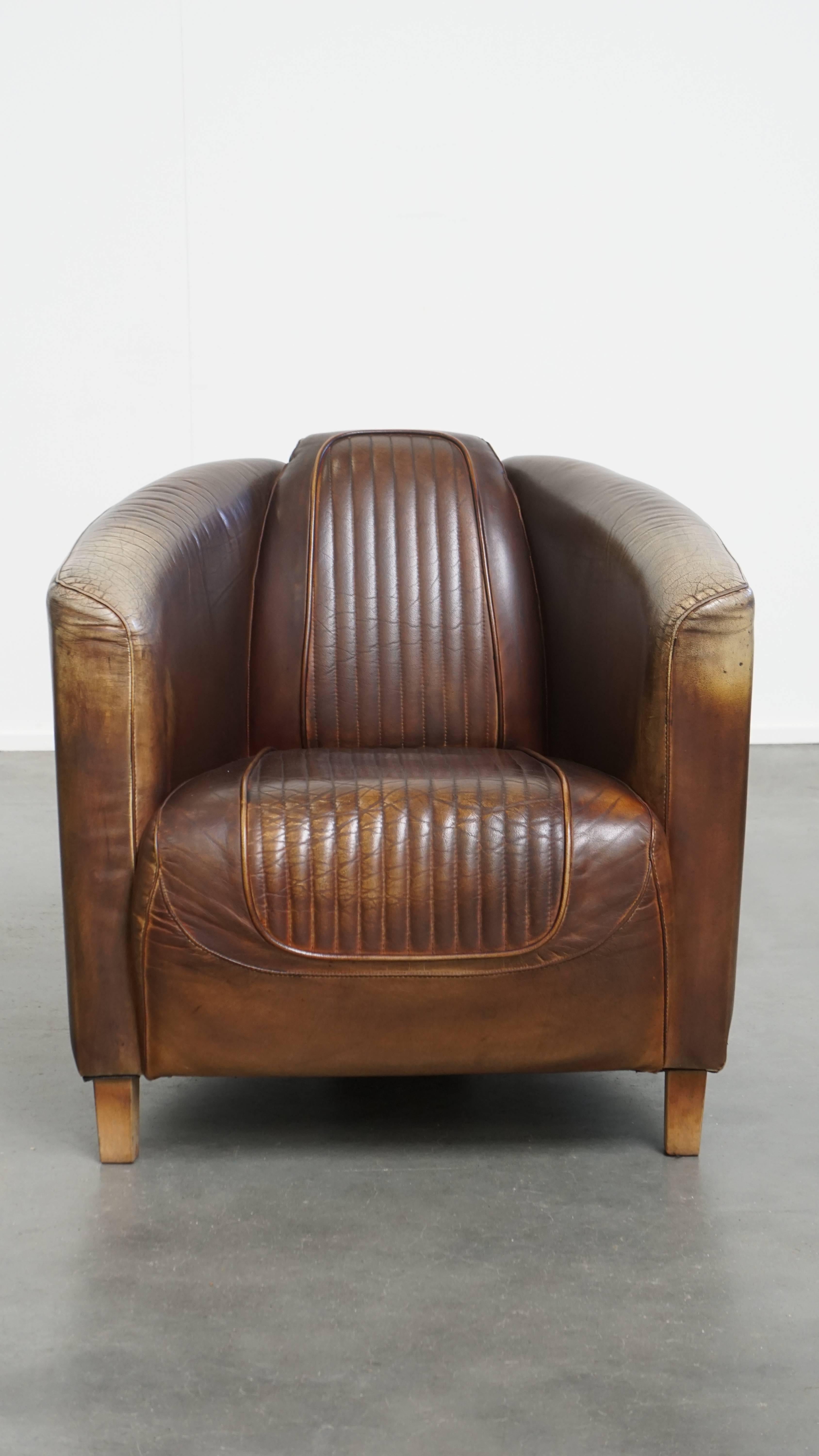 Offered: this timeless and exclusive cowhide aviator design armchair with a unique color scheme.
This unique and timeless armchair, made from cowhide leather, is a true eye-catcher and fits beautifully into almost any interior and room of your