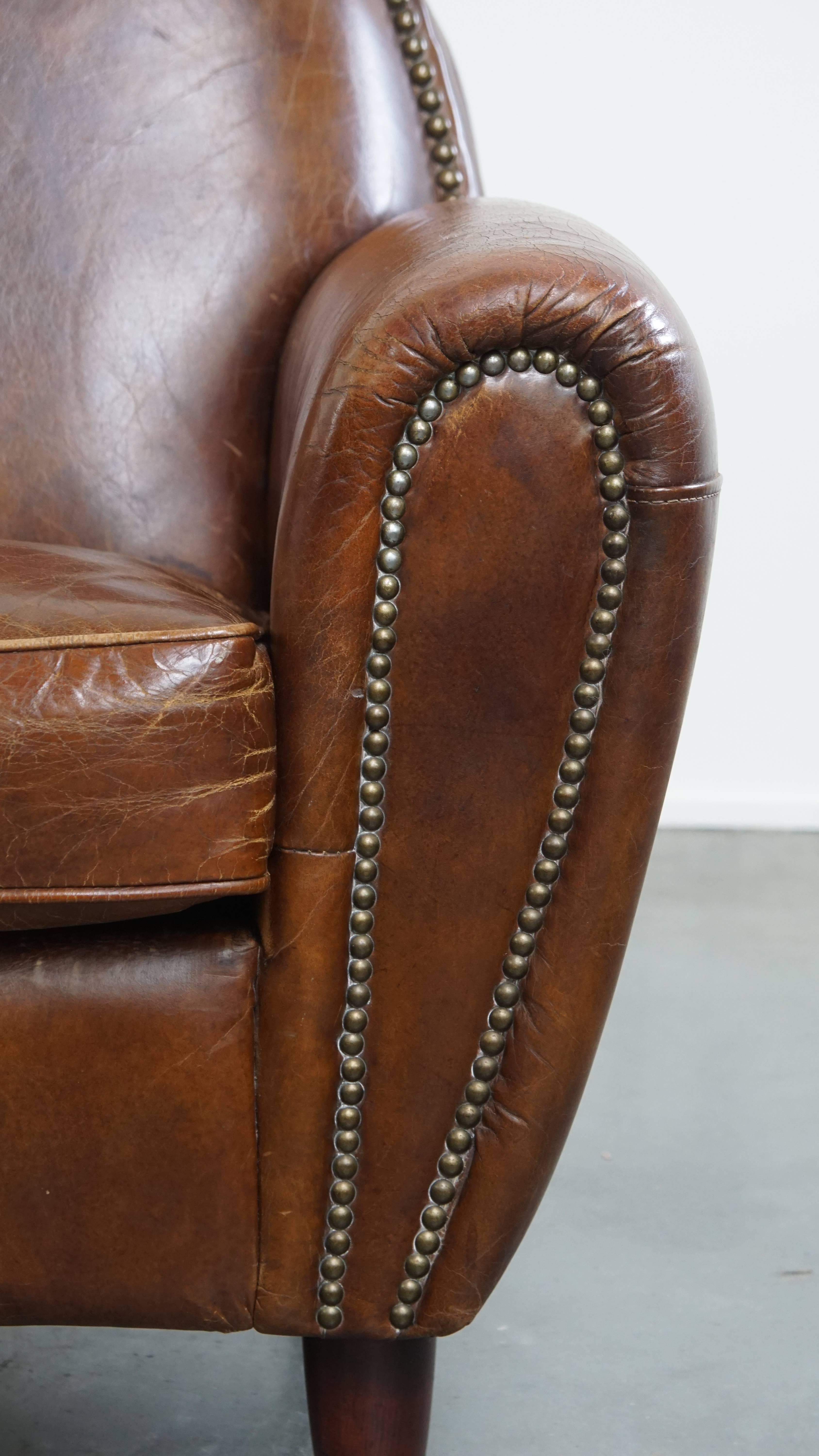 Sillón de diseño en piel de vaca con formas redondeadas en venta 3