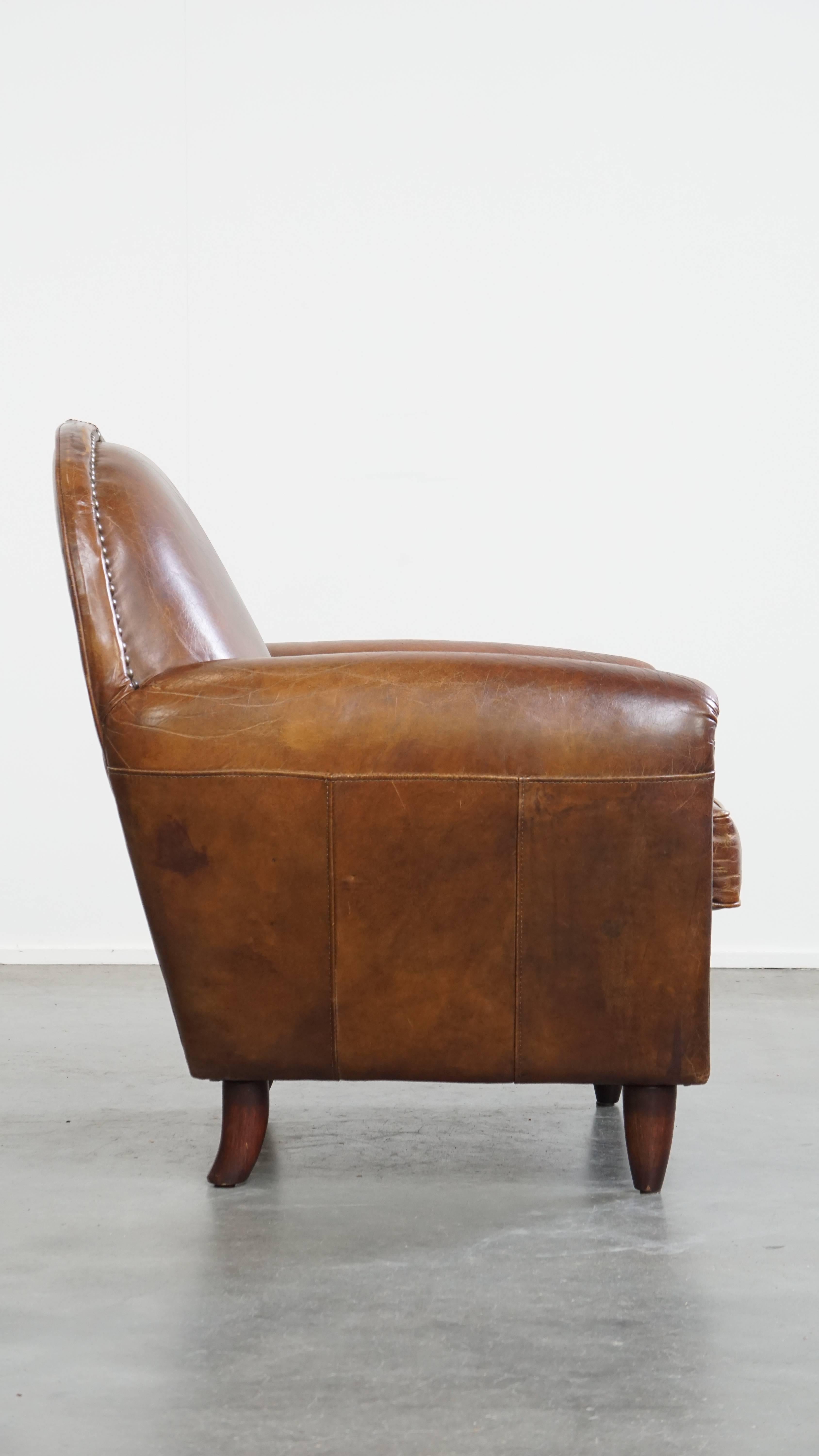 Sillón de diseño en piel de vaca con formas redondeadas Romano clásico en venta