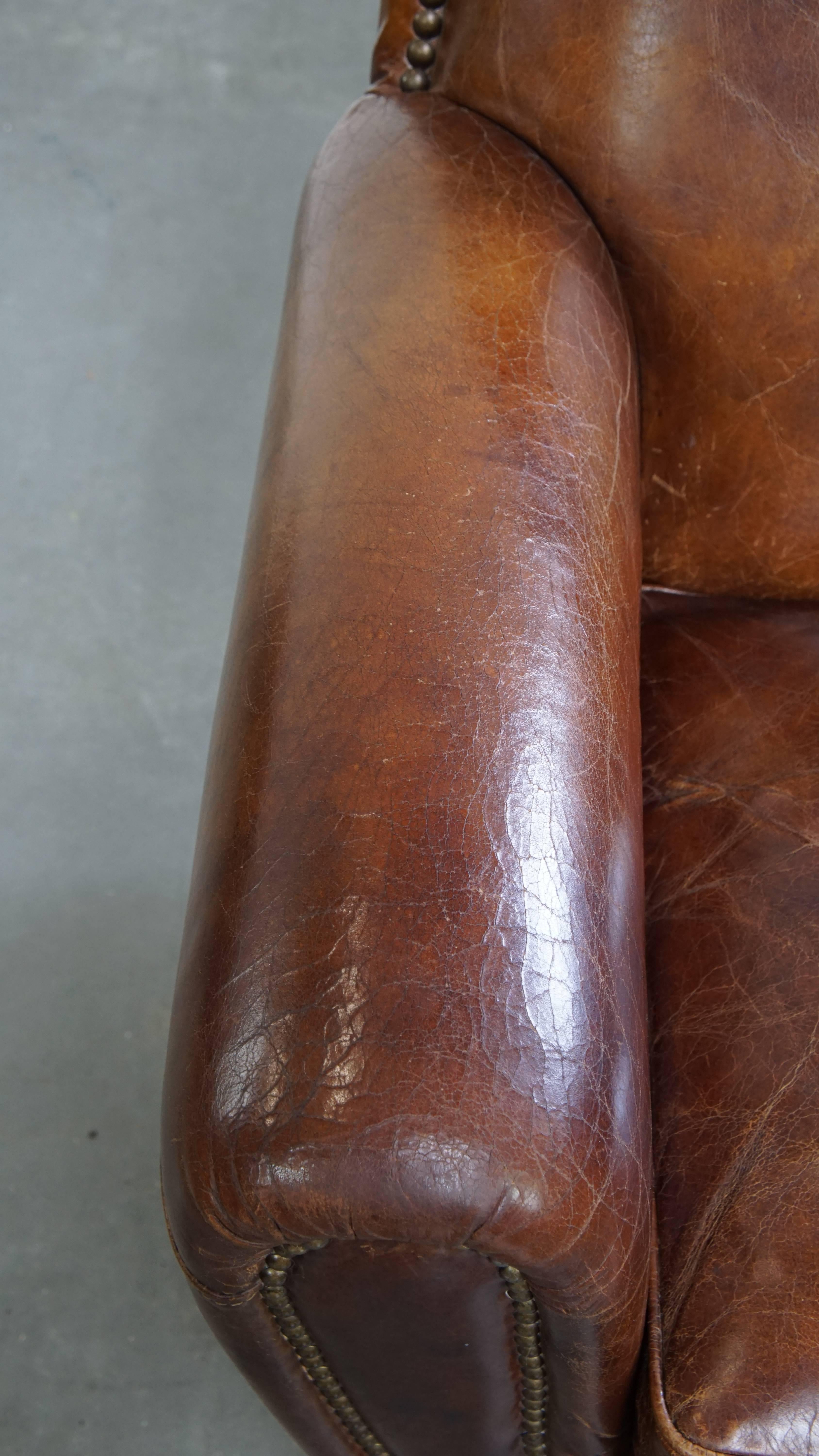 Sillón de diseño en piel de vaca con formas redondeadas Cuero de vaca en venta
