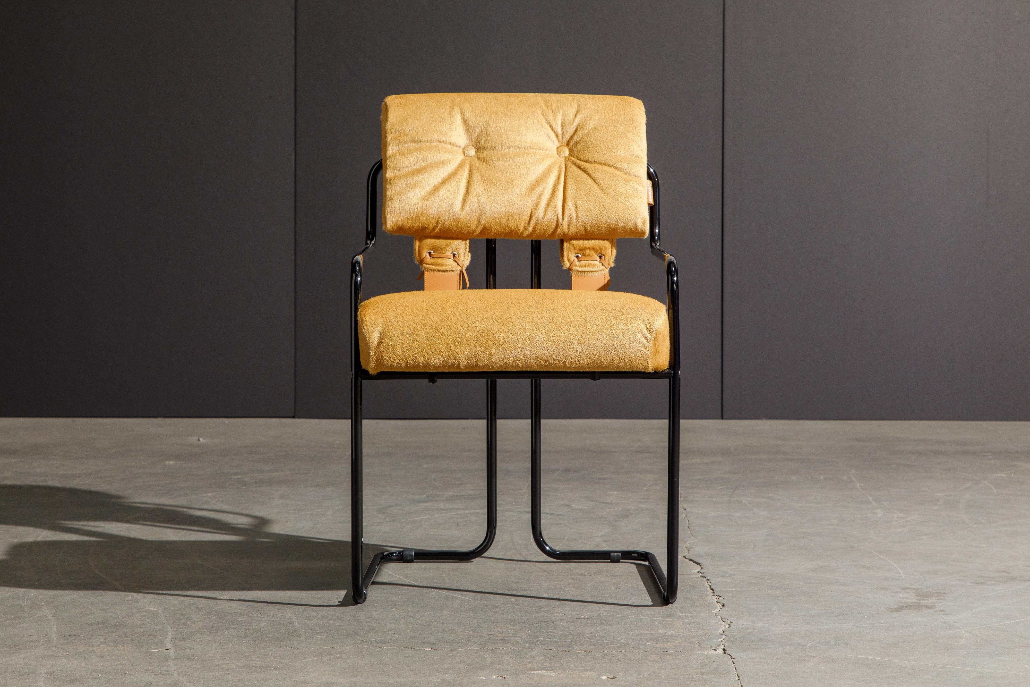 Currently, the most coveted dining chairs by interior designers are 'Tucroma' chairs by Guido Faleschini for i4 Mariani, and we have this incredible Tucroma armchair in beautiful (brand new) golden caramel colored cowhide leather (aka hair-on-hides)