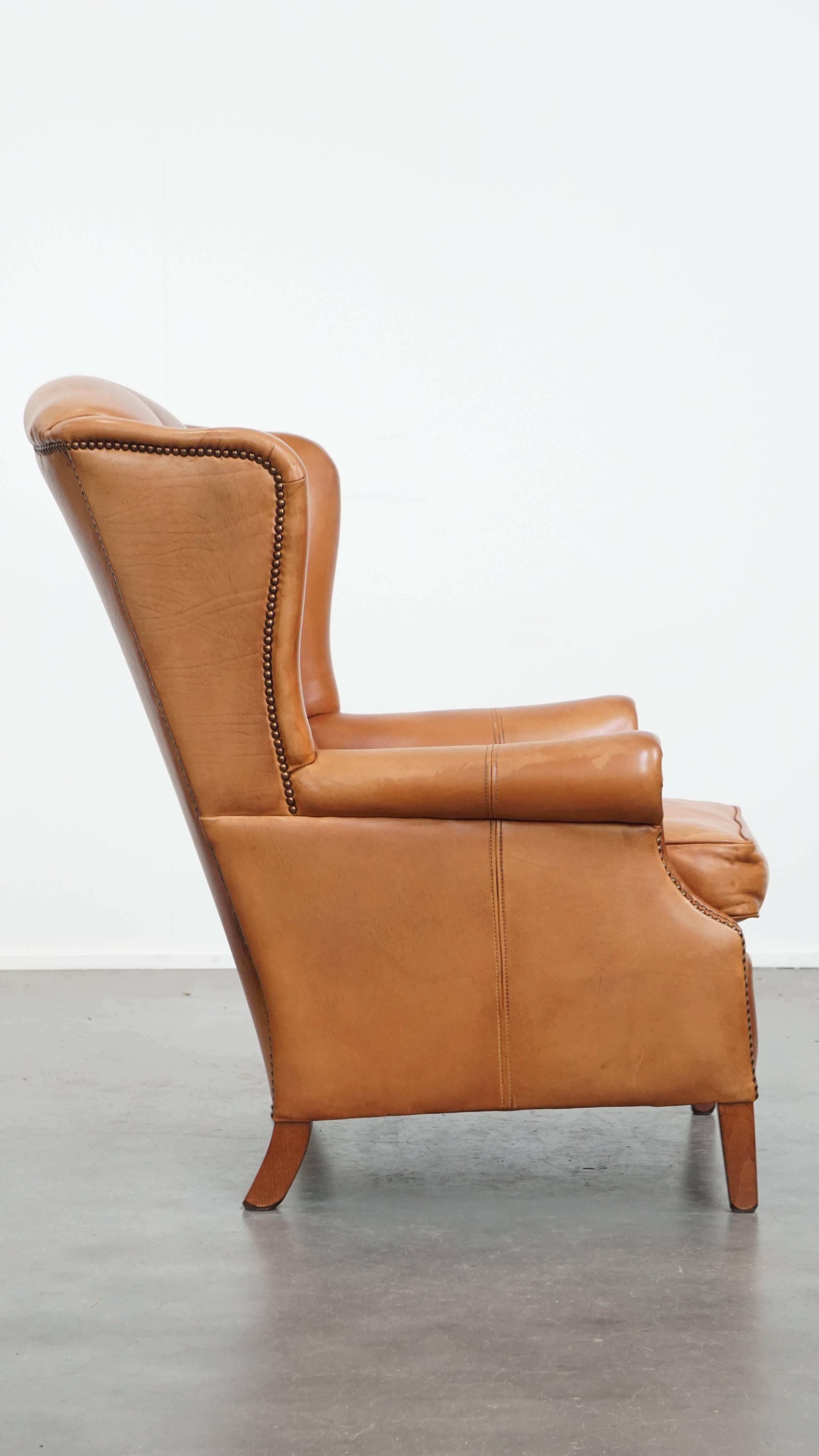 Romano classico Poltrona wingback in pelle di vacchetta in vendita