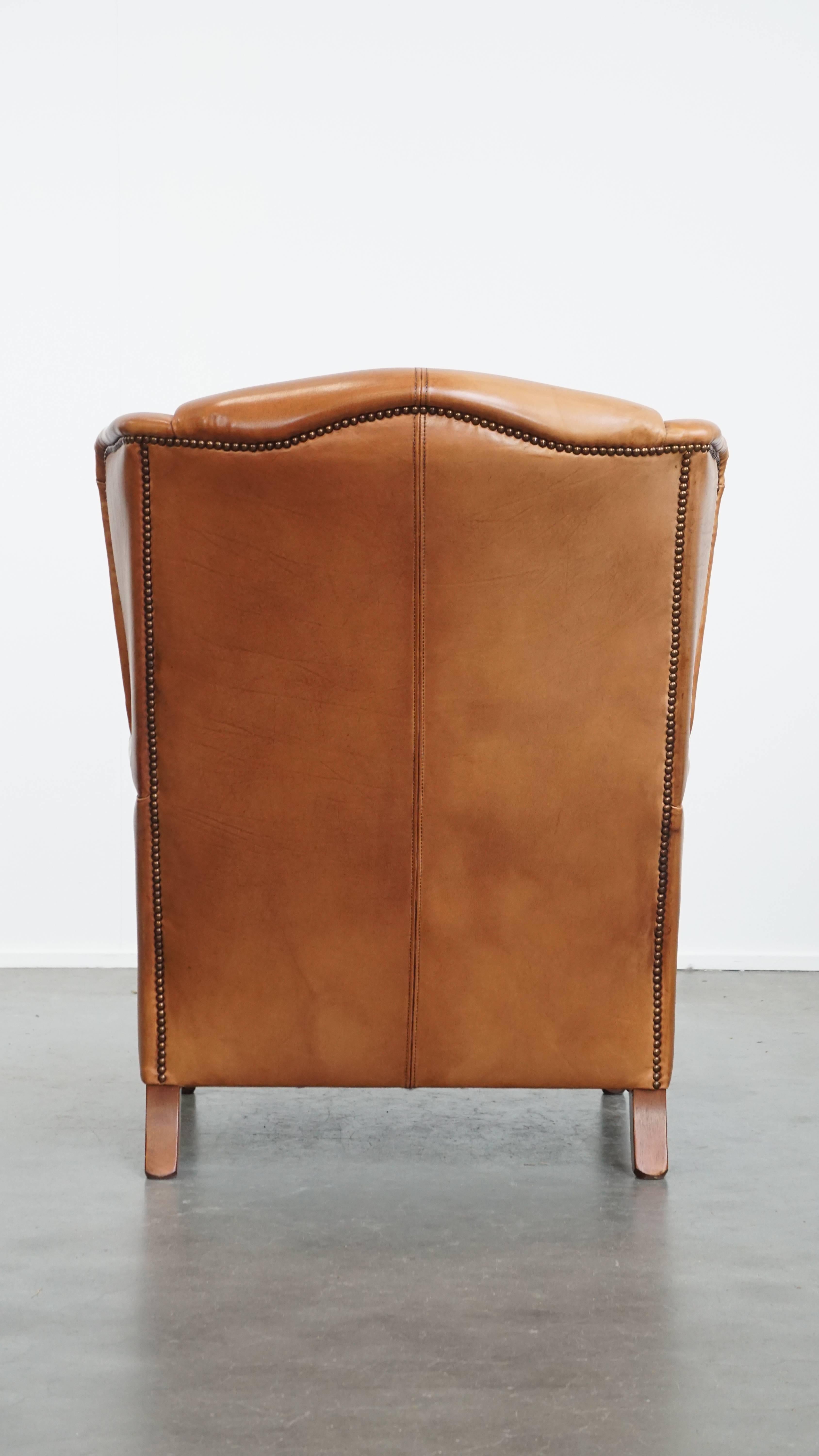 Fatto a mano Poltrona wingback in pelle di vacchetta in vendita