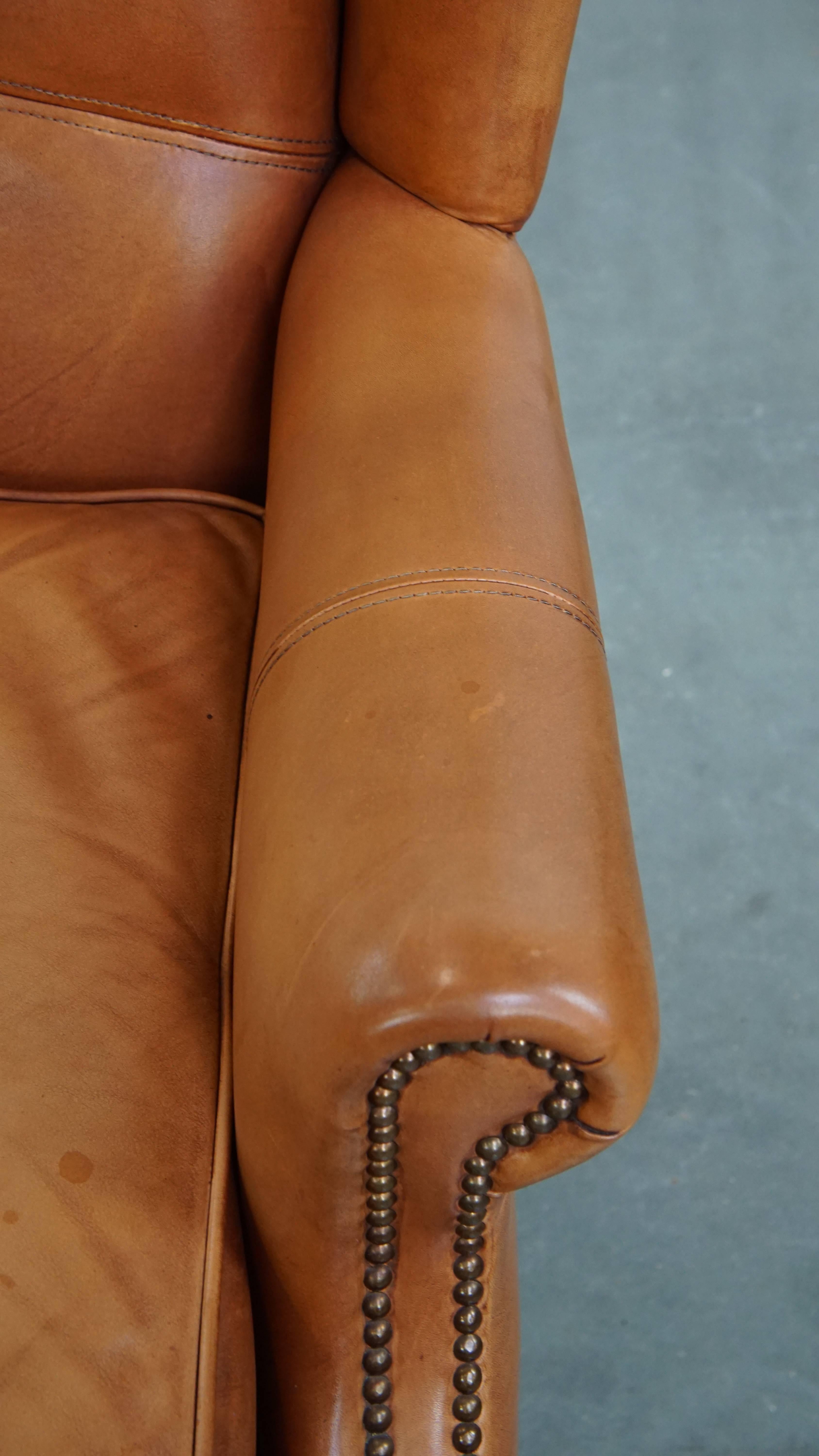 Poltrona wingback in pelle di vacchetta in vendita 1