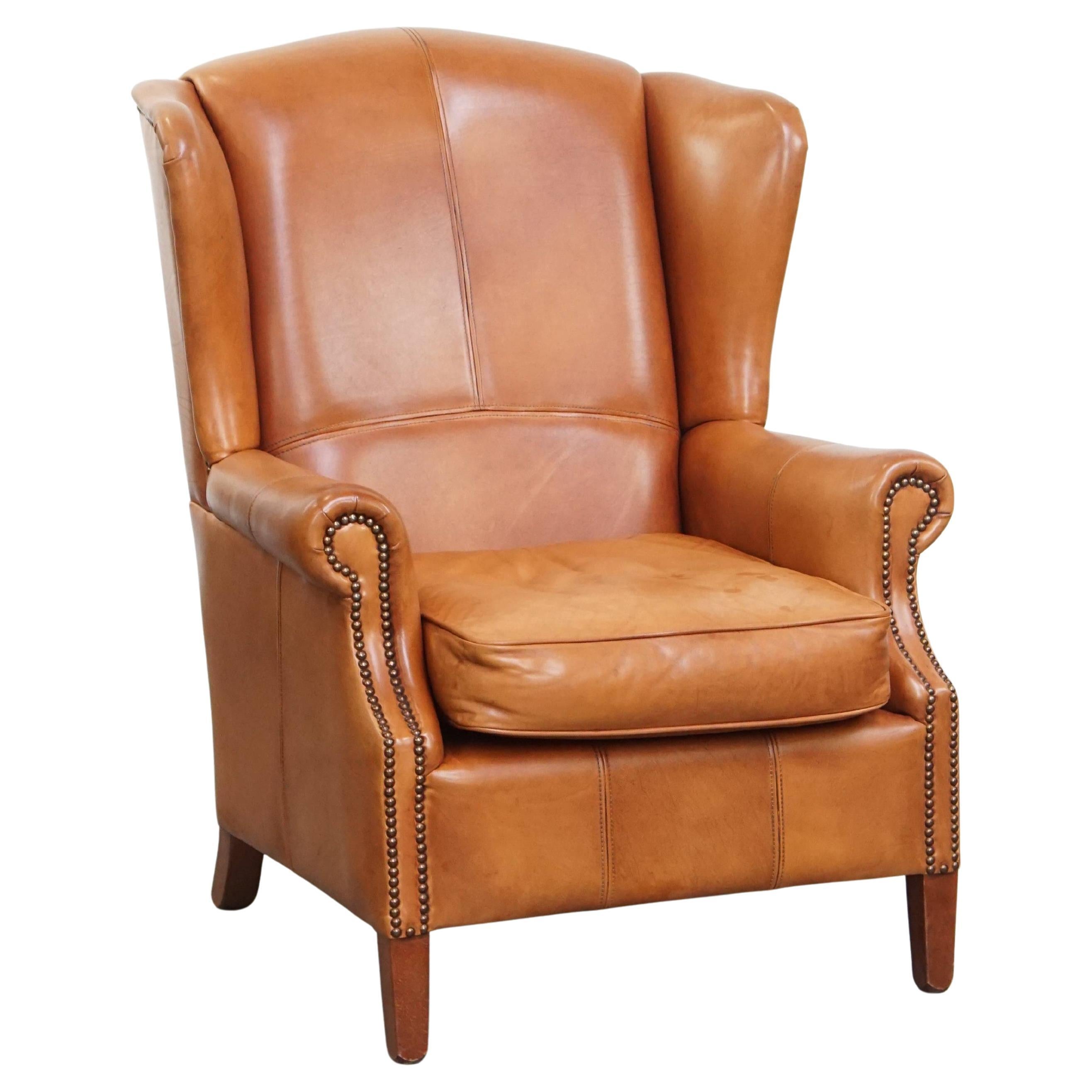 Poltrona wingback in pelle di vacchetta in vendita