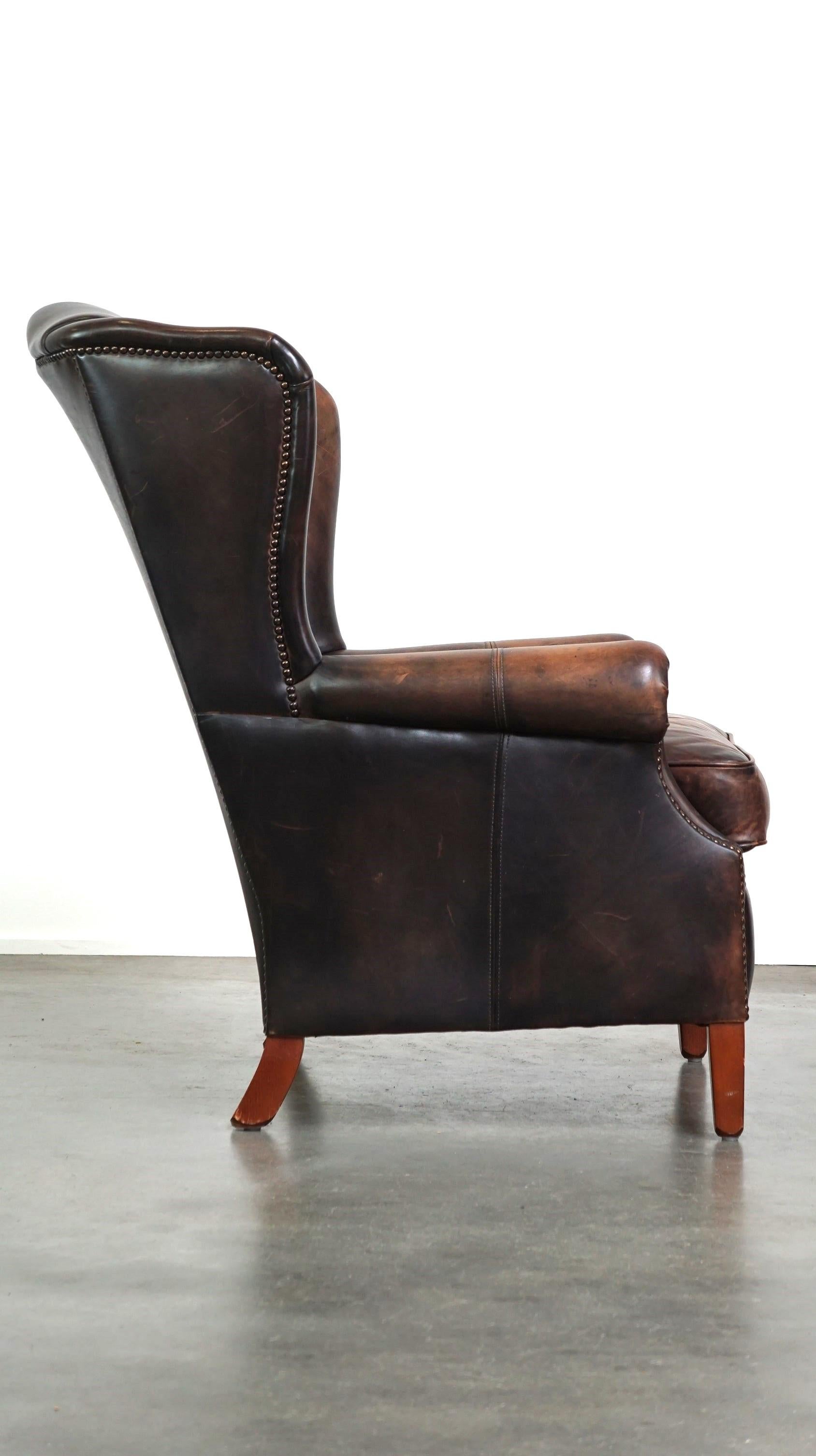 Cowhide Leather Wingback Armchair in English Style with Excellent Comfort In Good Condition For Sale In Harderwijk, NL
