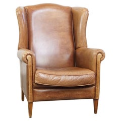Cowhide Leather Wingback Chair in Light Cognac Color
