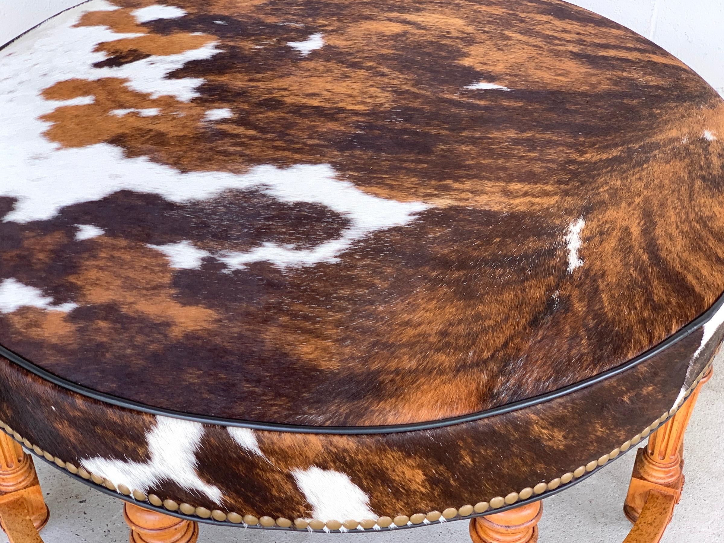 Fruitwood Cowhide Ottoman by Hancock and Moore For Sale