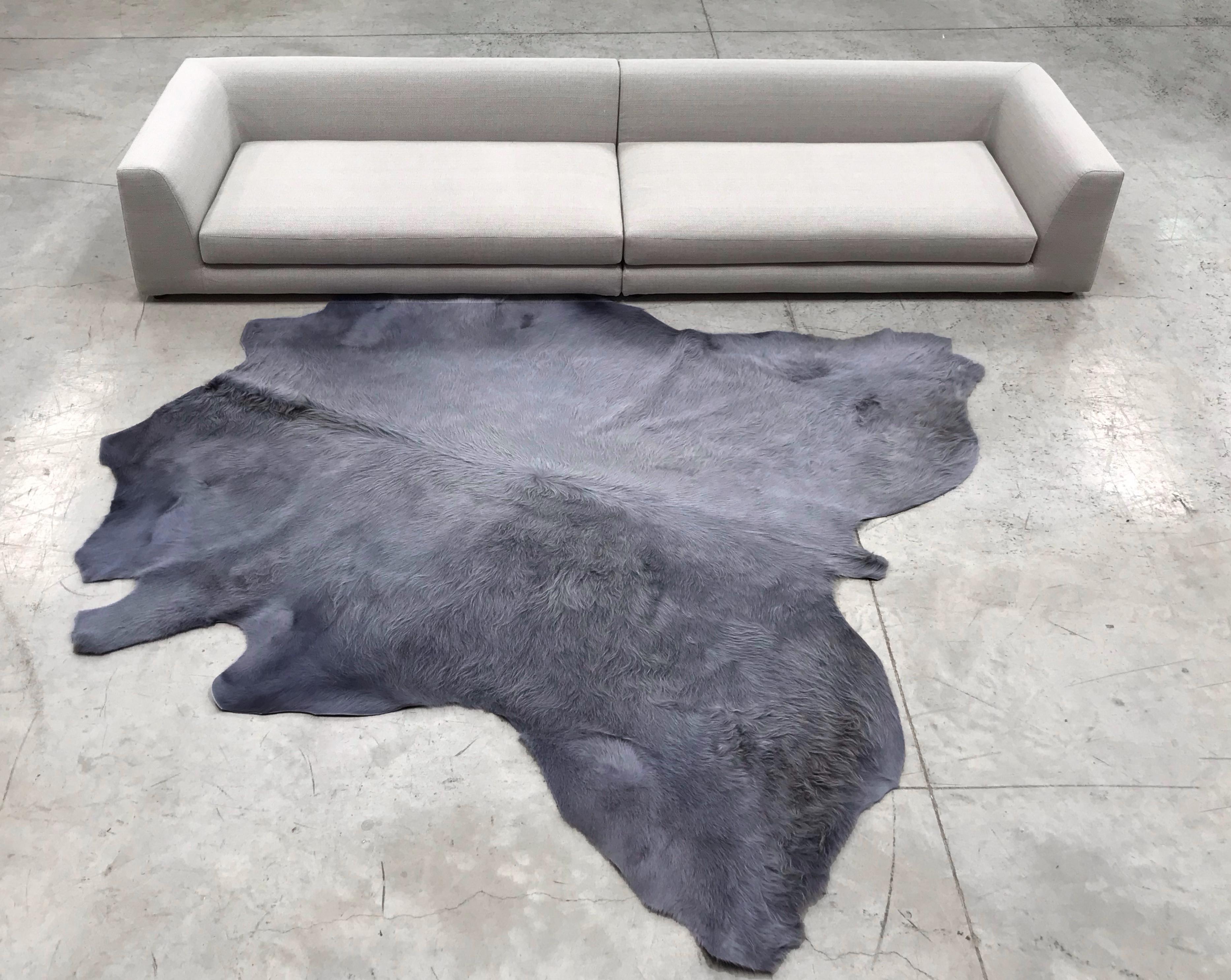 Cowhide rugs in Khaki, sustainably sourced and hand-dyed.
Approximate dimensions: 230-260 x 230-260cm
Six different colors: Salmon pink, burgundy, khaki, light grey, mid grey and black

Please note that color hues may vary from batch to batch