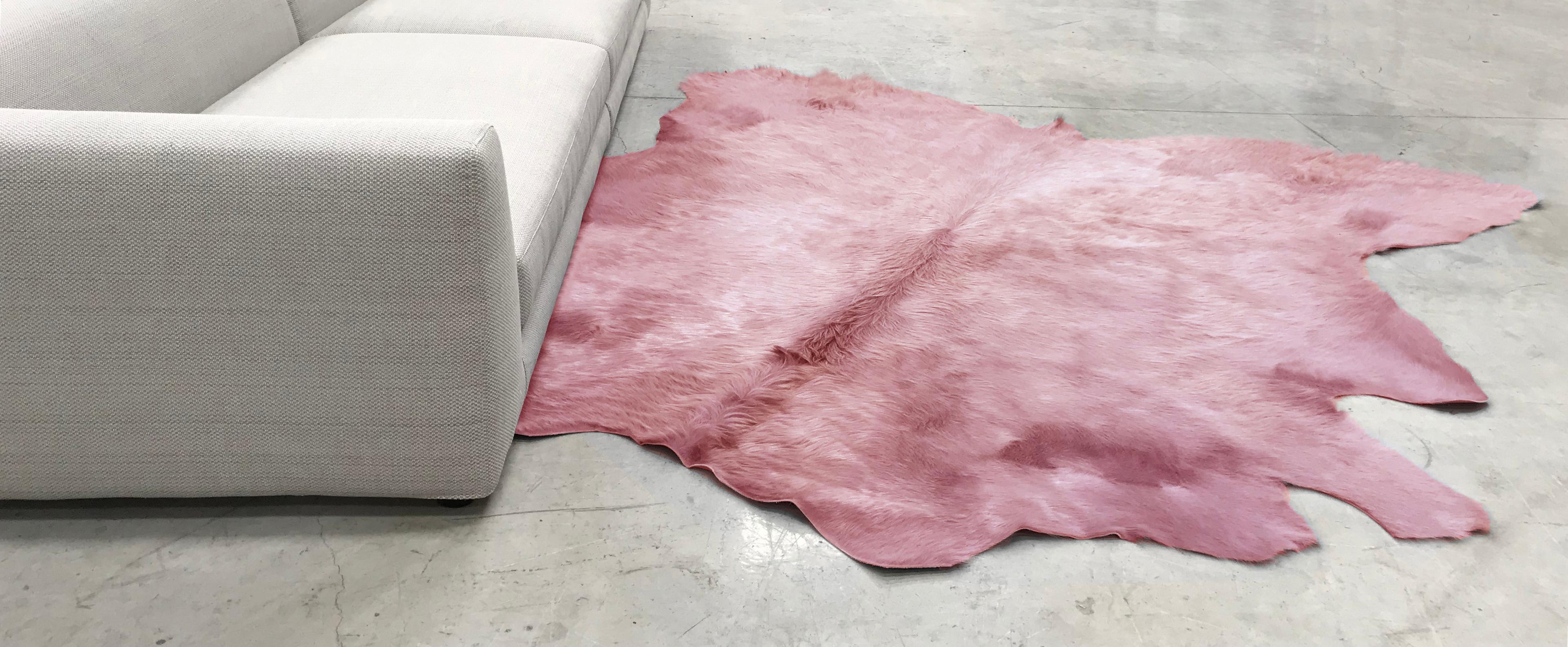 Cowhide rugs in Khaki, sustainably sourced and hand-dyed. 
Approximate dimensions: 230-260 x 230-260cm 
Six different colors: Salmon Pink, Burgundy, Khaki, Light Grey, Mid Grey and Black

Please note that color hues may vary from batch to batch
