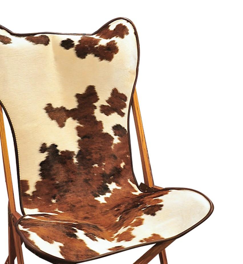 Cette chaise est basée sur les prototypes de sièges pliables créés au 19e siècle par J.B. Fenby, qui s'est lui-même inspiré des chaises berbères traditionnelles. La Tripolina est une chaise durable fabriquée à la main à Rome par Dario Alfonsi. Elle