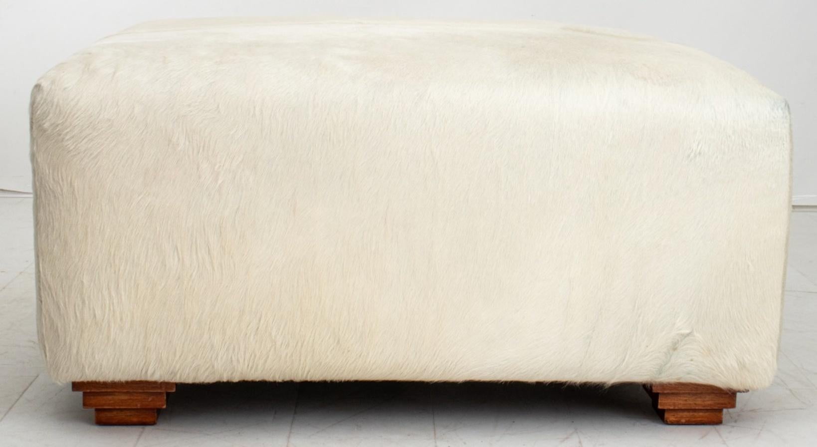 Cowhide Upholstered Storage Pouf or Ottoman In Good Condition For Sale In New York, NY