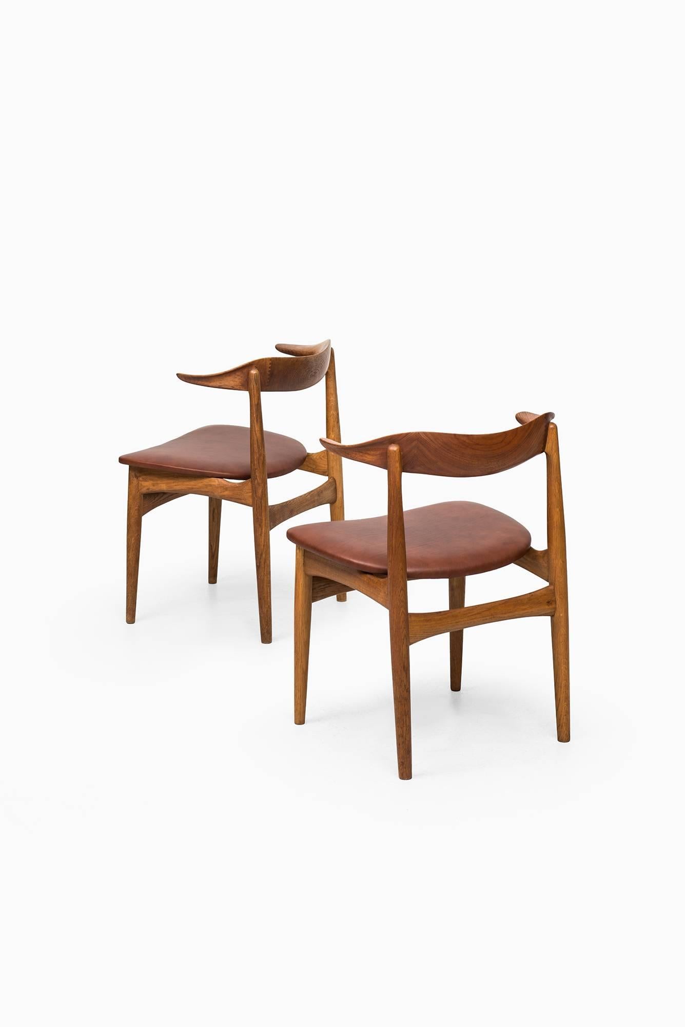 Mid-20th Century Cowhorn Chairs Designed by Knud Faerch Produced by Slagelse Møbelfabrik