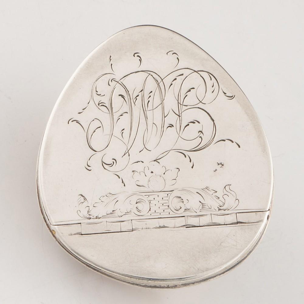 Heading : Cowrie shell snuff box
Date : c1820
Period : George III / Regency
Origin : Most likely Scottish Provincial
Decoration : Silver mounted cowrie shell with monogram, parcel gilt interior
Size :  6.6x5.7x3cm
Condition : Excellent, no dings - a