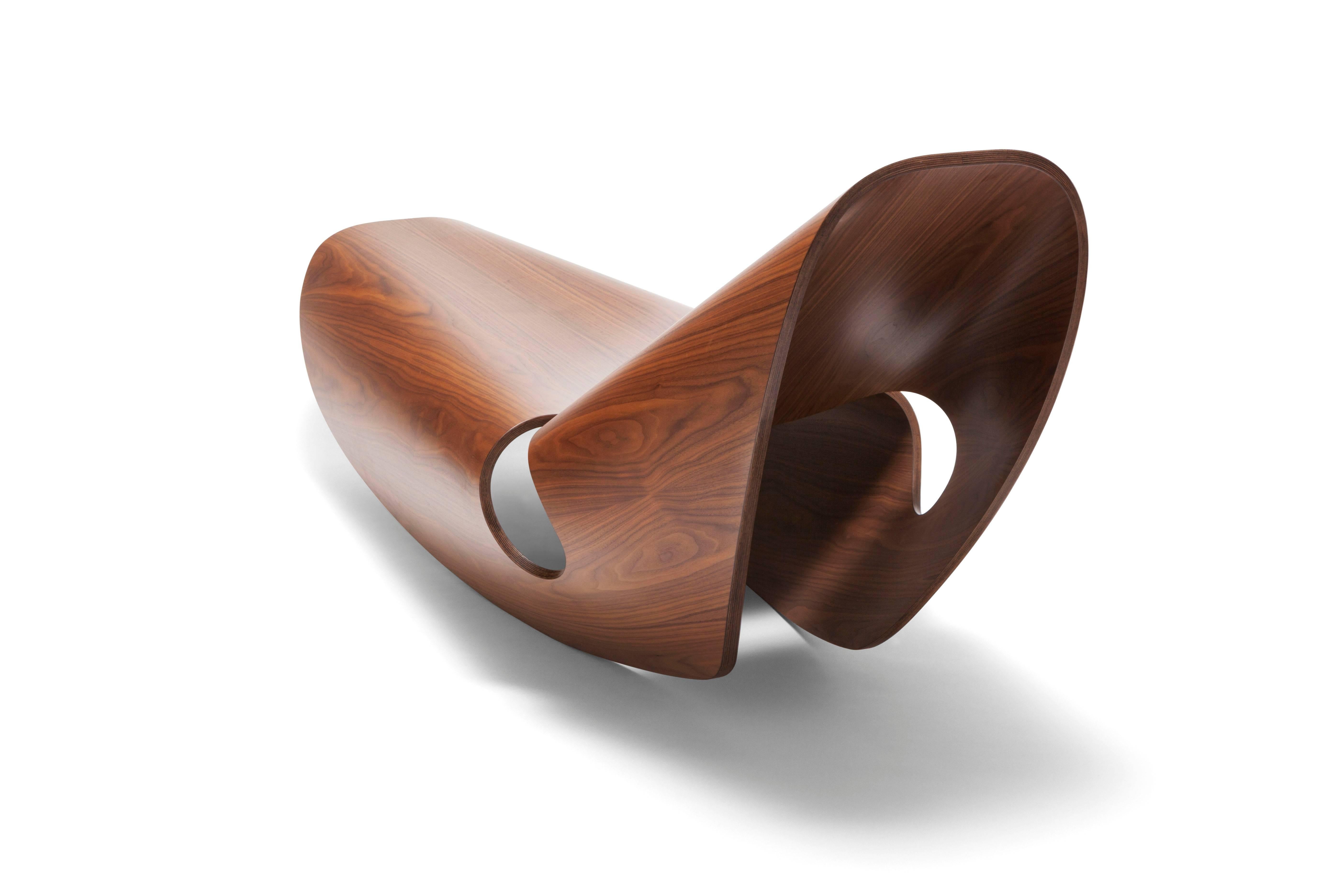 Organic in form, and iconic in design, the Cowrie Rocker is inspired by the concave lines of sea shells. The modern curvilinear form is the result of an extensive research and innovation process that bridges the handmade with the digital. Sweeping