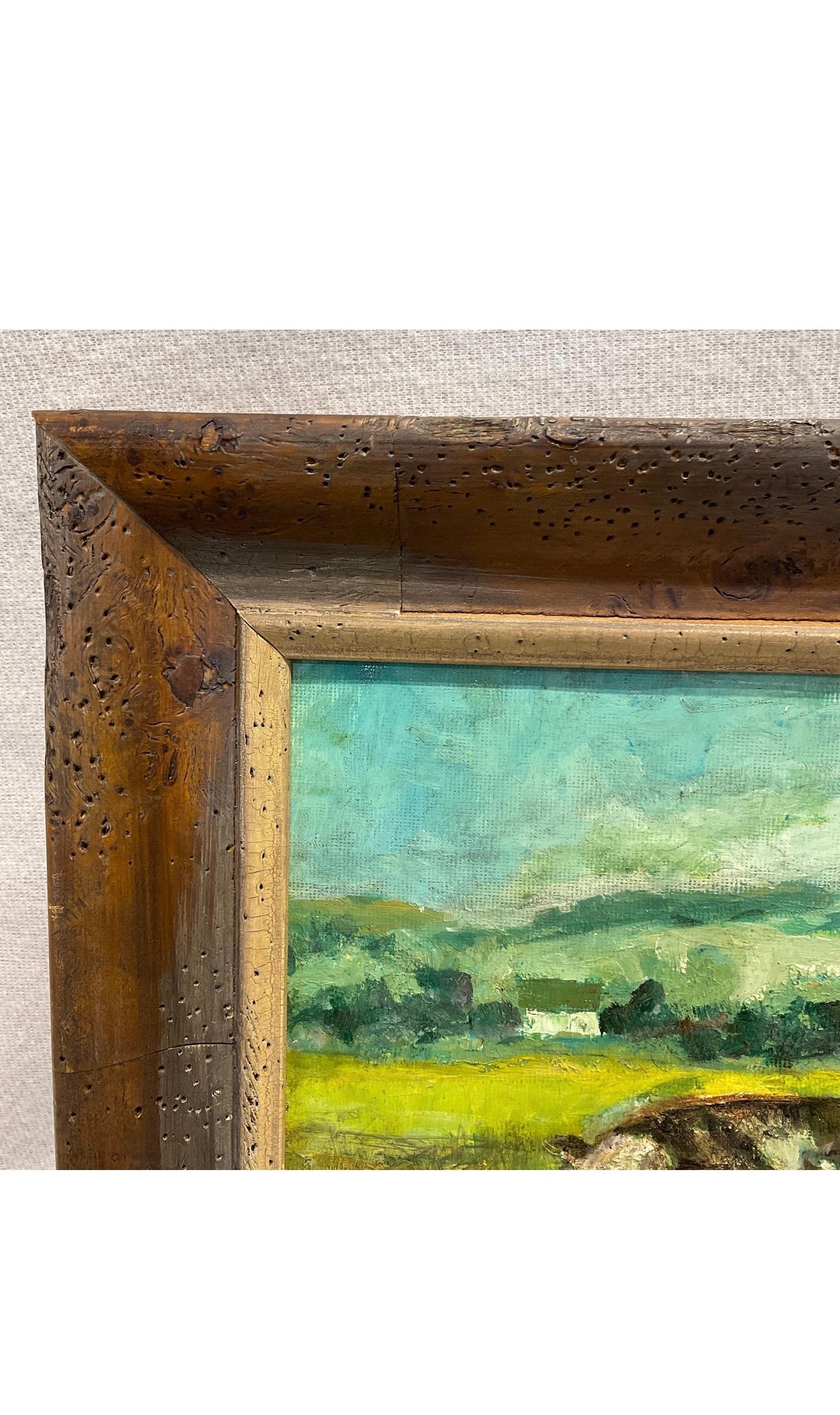 This antique oil pastoral scene has lovely colors! The horizon displays multiple hues of blue in the rolling hills and clouds, and the field has a mixture of green and earthly tones, surrounding the three cows. This piece has nice texture that is
