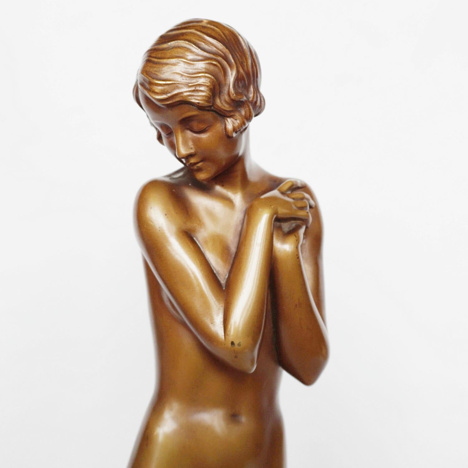 Coy Maiden, a large Art Deco, cold painted bronze figure by Josef Lorenzl (1892-1950). A nude woman standing, concealing her modesty. Set over original marble base. 

Signed Lorenzl to bronze

Josef Lorenzl, born 1stSeptember 1892 began his