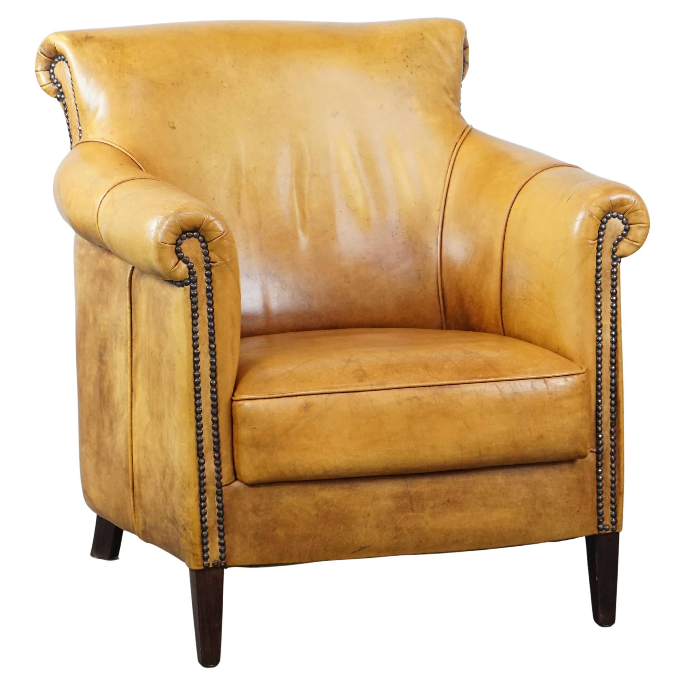 Cozy, comfortable cow leather armchair in a unique color