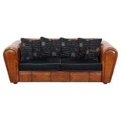 Vintage Cozy spacious 2.5-seater sheepskin leather designer sofa with fabric cushions