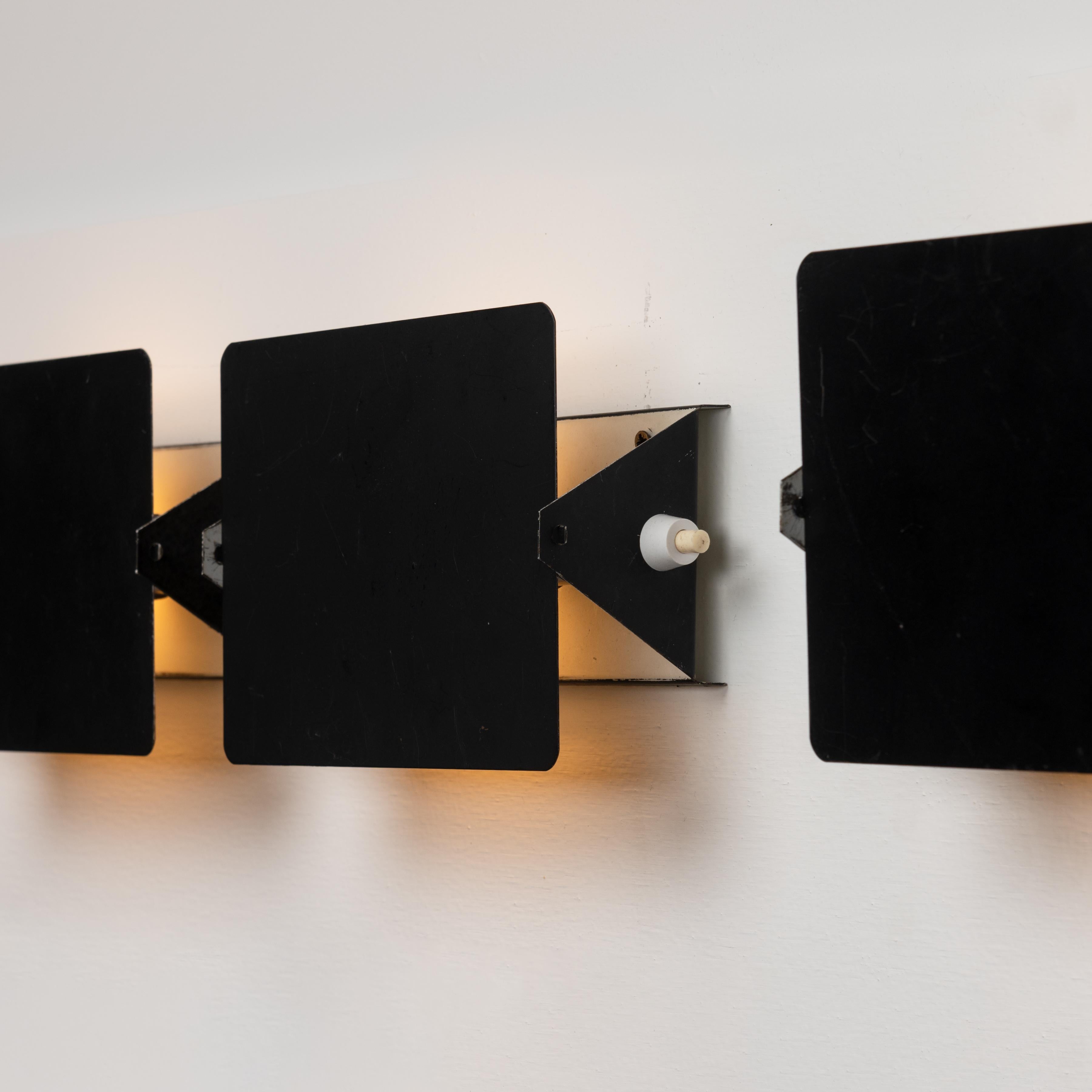 Patinated CP1 Sconces by Charlotte Perriand  For Sale