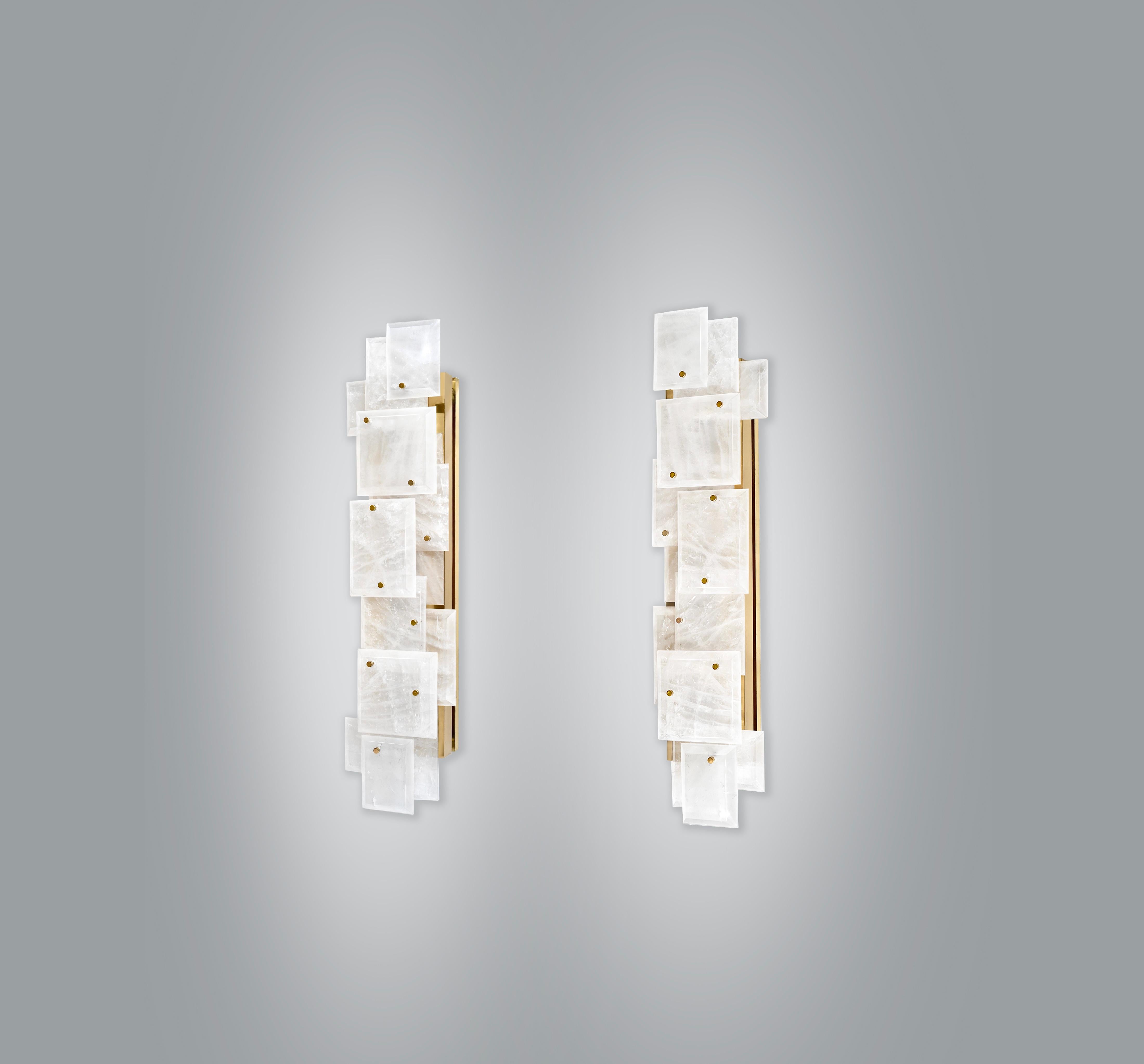 Pair of modern rock crystal quartz sconces with multiple panels decorations in polished brass finish. Created by Phoenix Gallery.
Each sconce installed four sockets, use four 75 watts Led warm light bulbs, 300watts total. Light bulbs supplied.
   