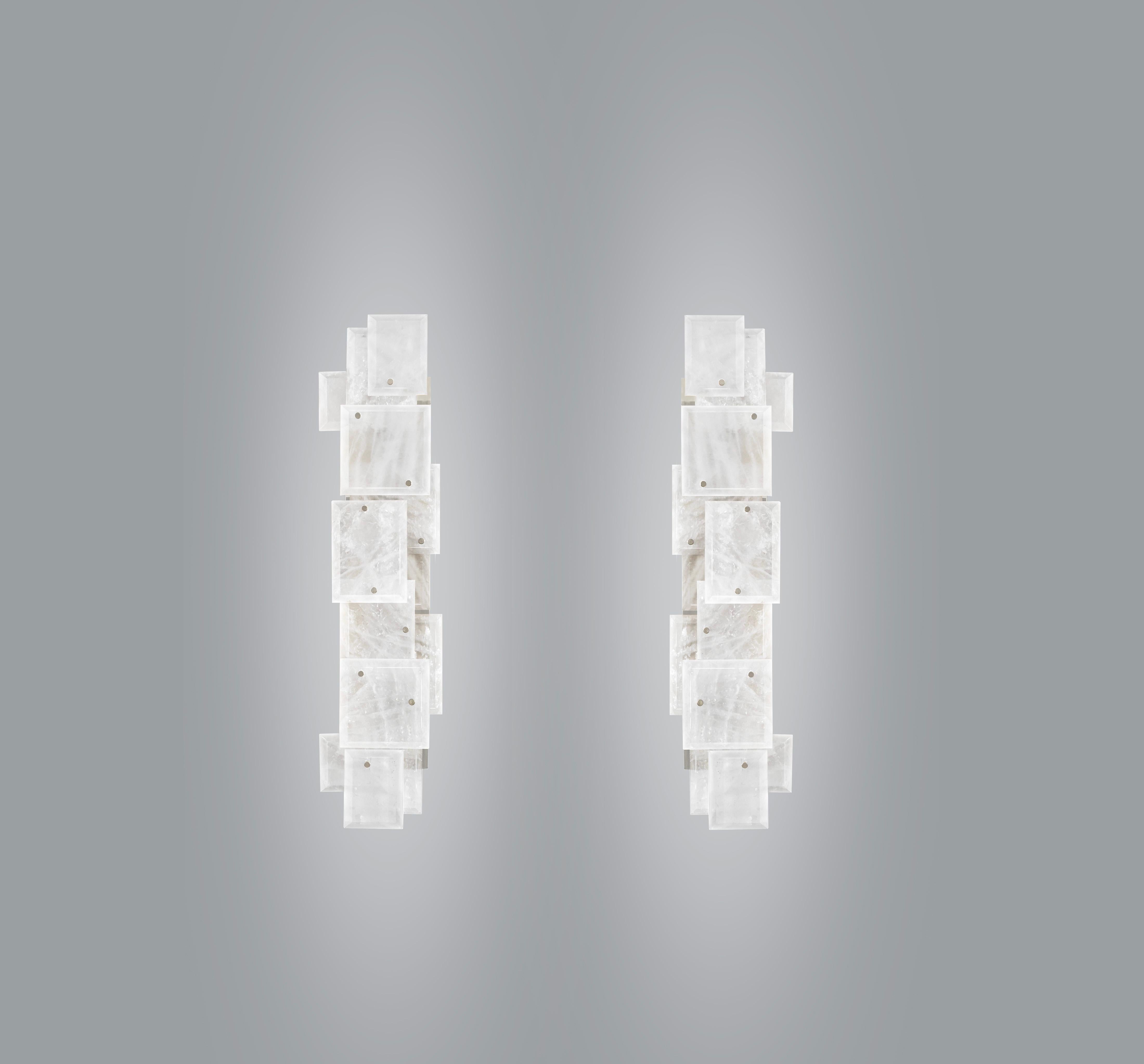 Pair of modern rock crystal quartz sconces with multiple panels decorations in matte nickel finish. Created by Phoenix Gallery.

Each sconce installed four sockets, use four 75 watts Led warm light bulbs, 300watts total. Light bulbs supplied.