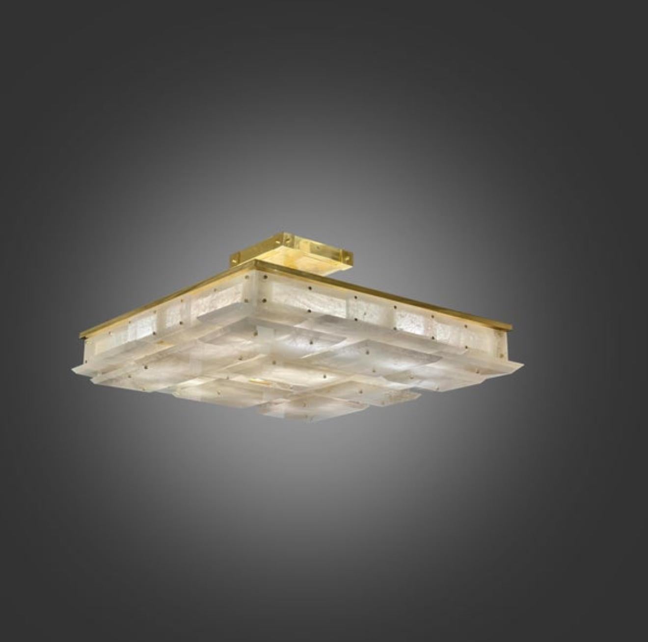 A modern rock crystal semi flush mount with multiple panels decorations, antique brass mount. Created by Phoenix Gallery, NYC.
     